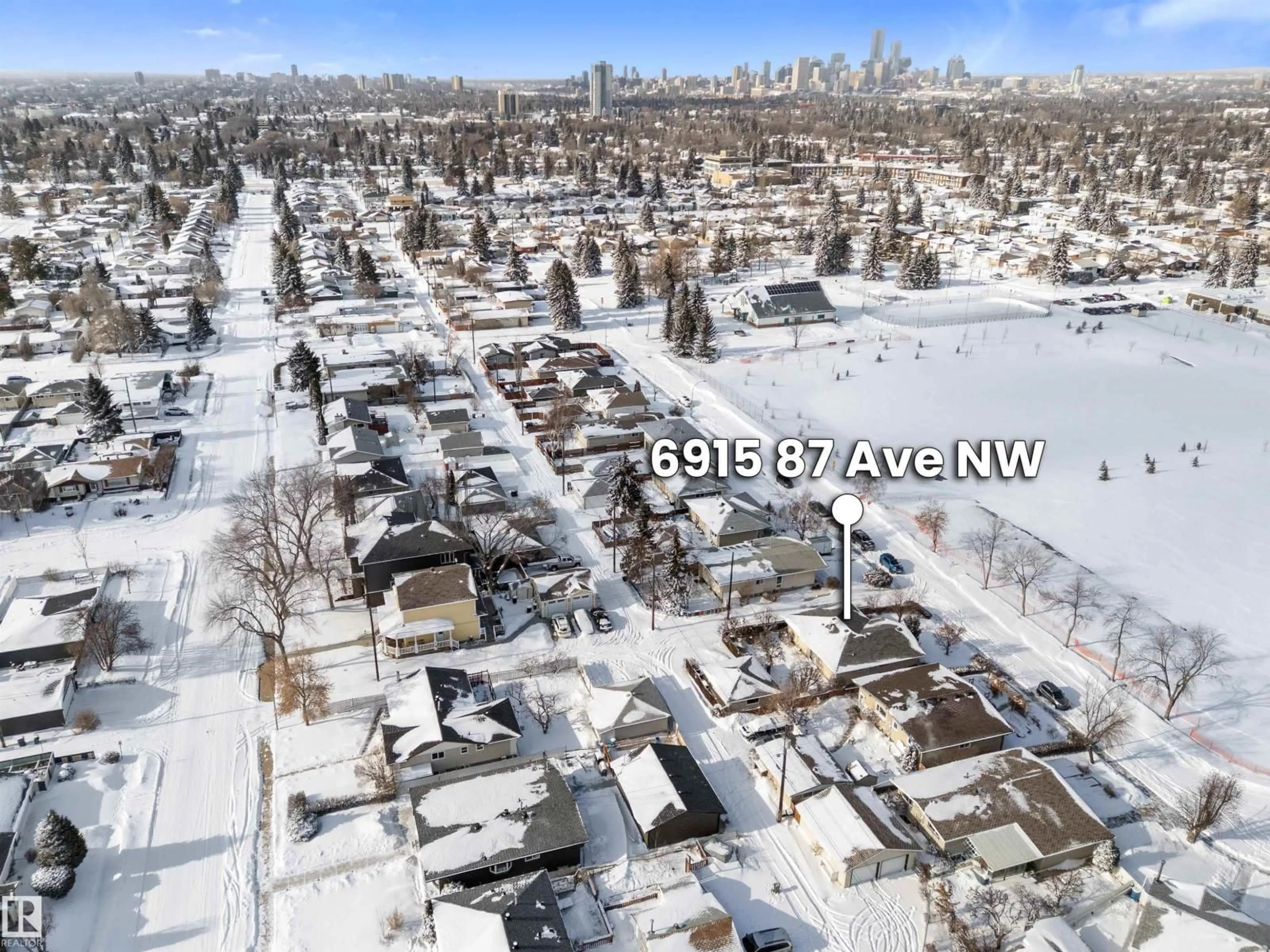 A pic from outside/outdoor area/front of a property/back of a property/a pic from drone, street for 6915 87 AV, Edmonton Alberta T6B0L5
