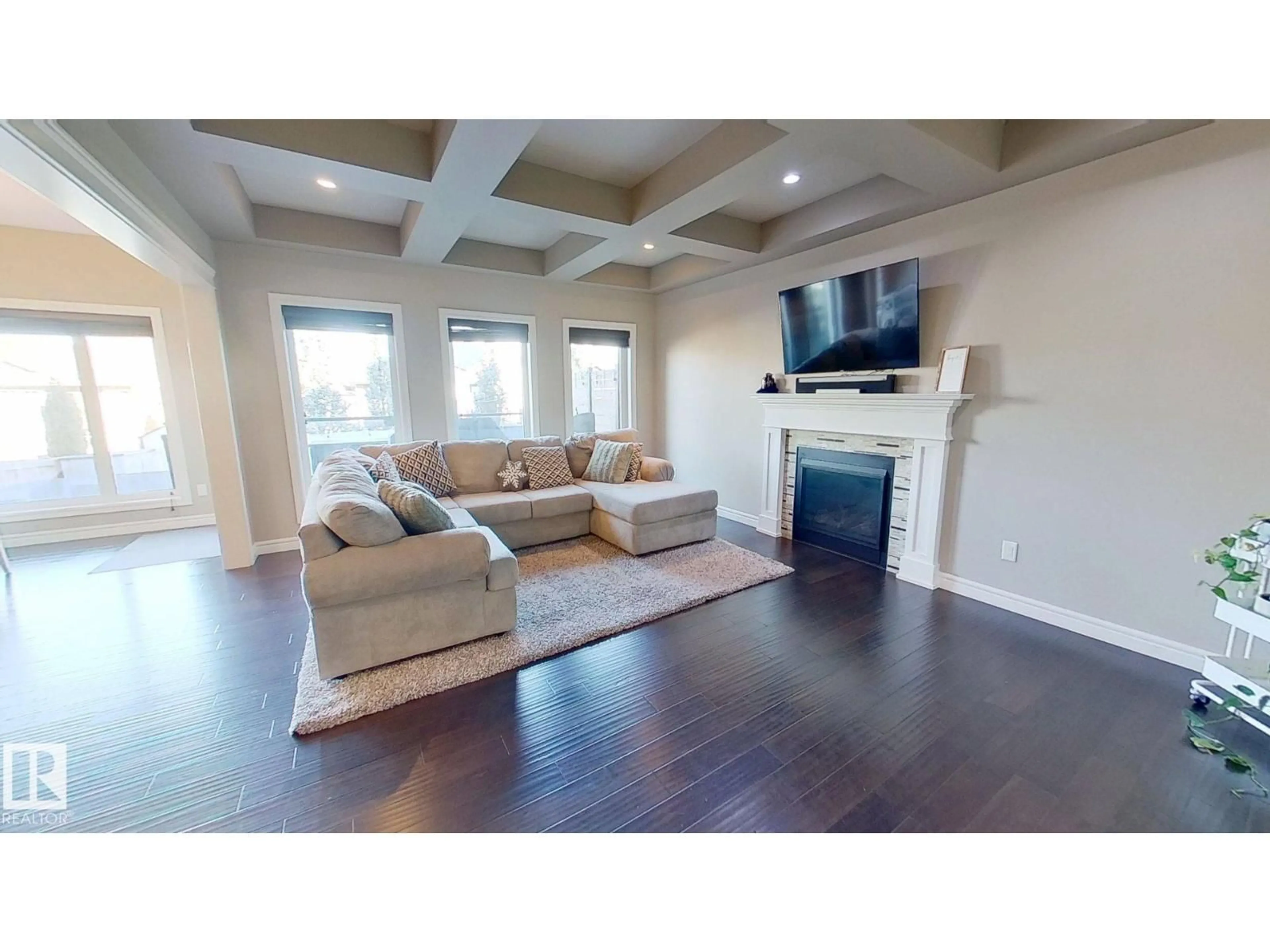 Living room with furniture, wood/laminate floor for 45 SUMMERSTONE LN, Sherwood Park Alberta T8H0Y4