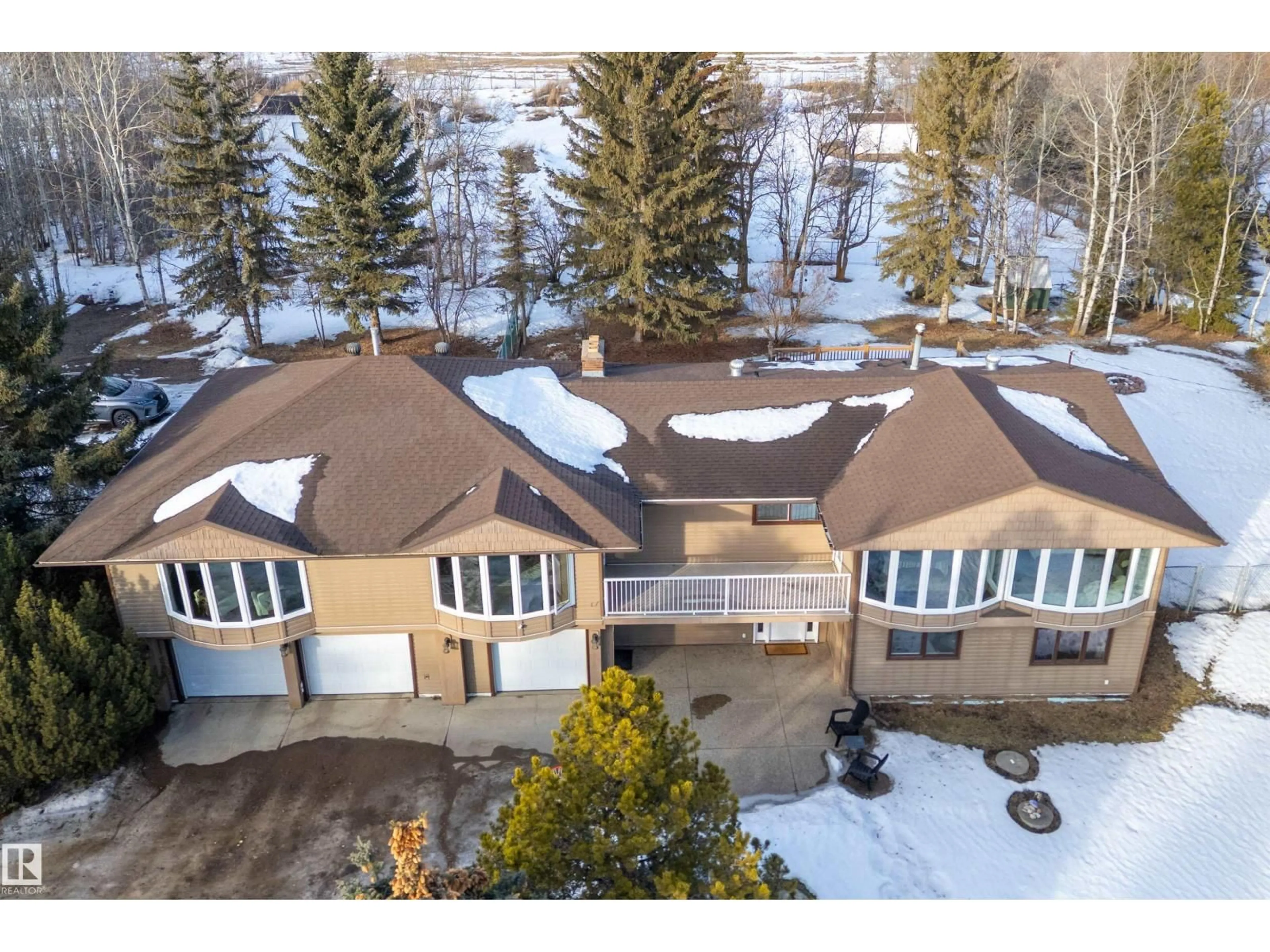 A pic from outside/outdoor area/front of a property/back of a property/a pic from drone, unknown for 74 52312 RGE ROAD 225, Rural Strathcona County Alberta T8C1E1