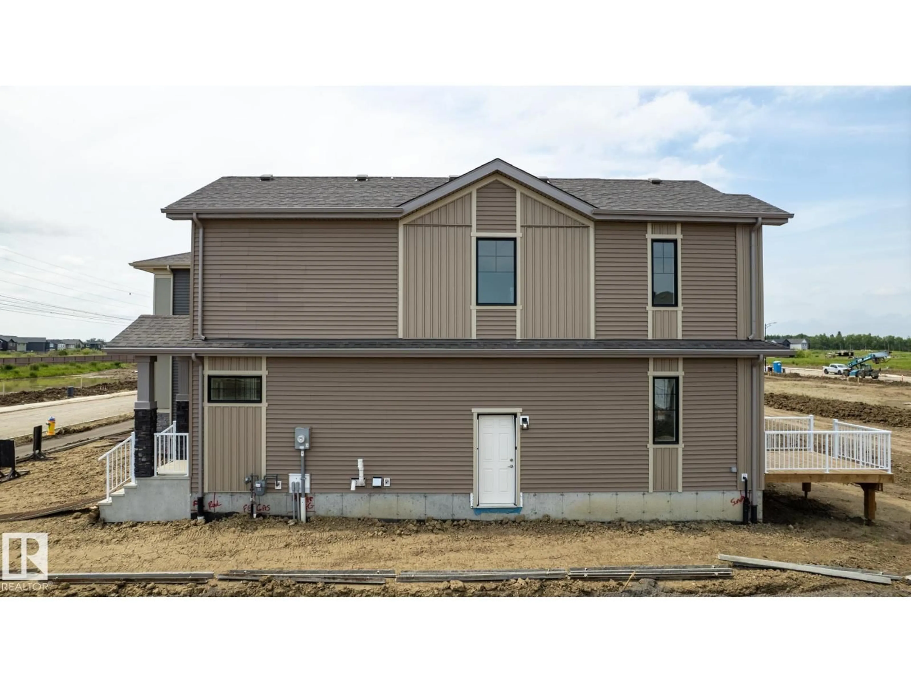 Home with vinyl exterior material, building for 19512 30 AV, Edmonton Alberta T6M1M2