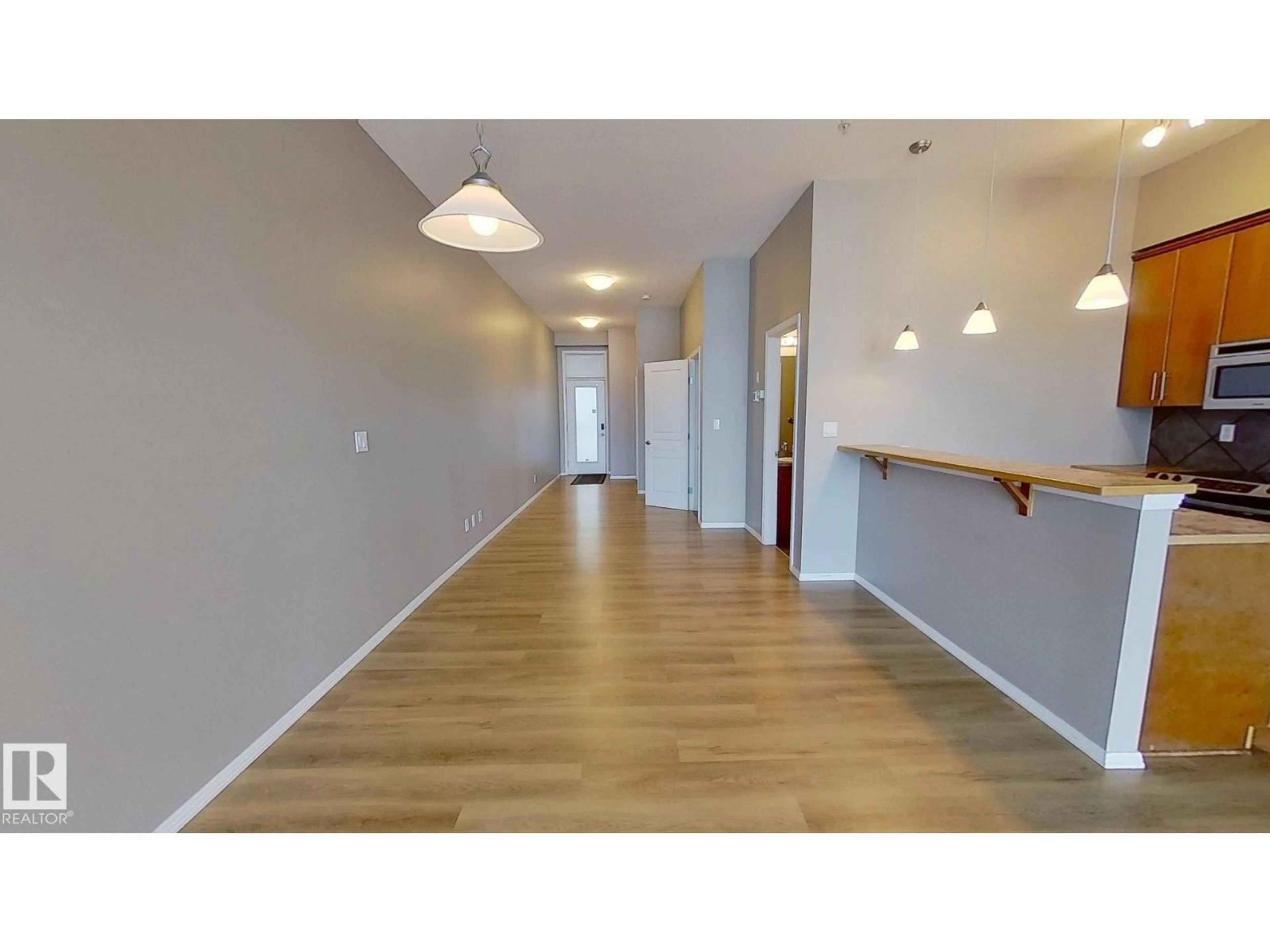 A pic of a room for #215 - 10531 117 ST, Edmonton Alberta T5H0A8