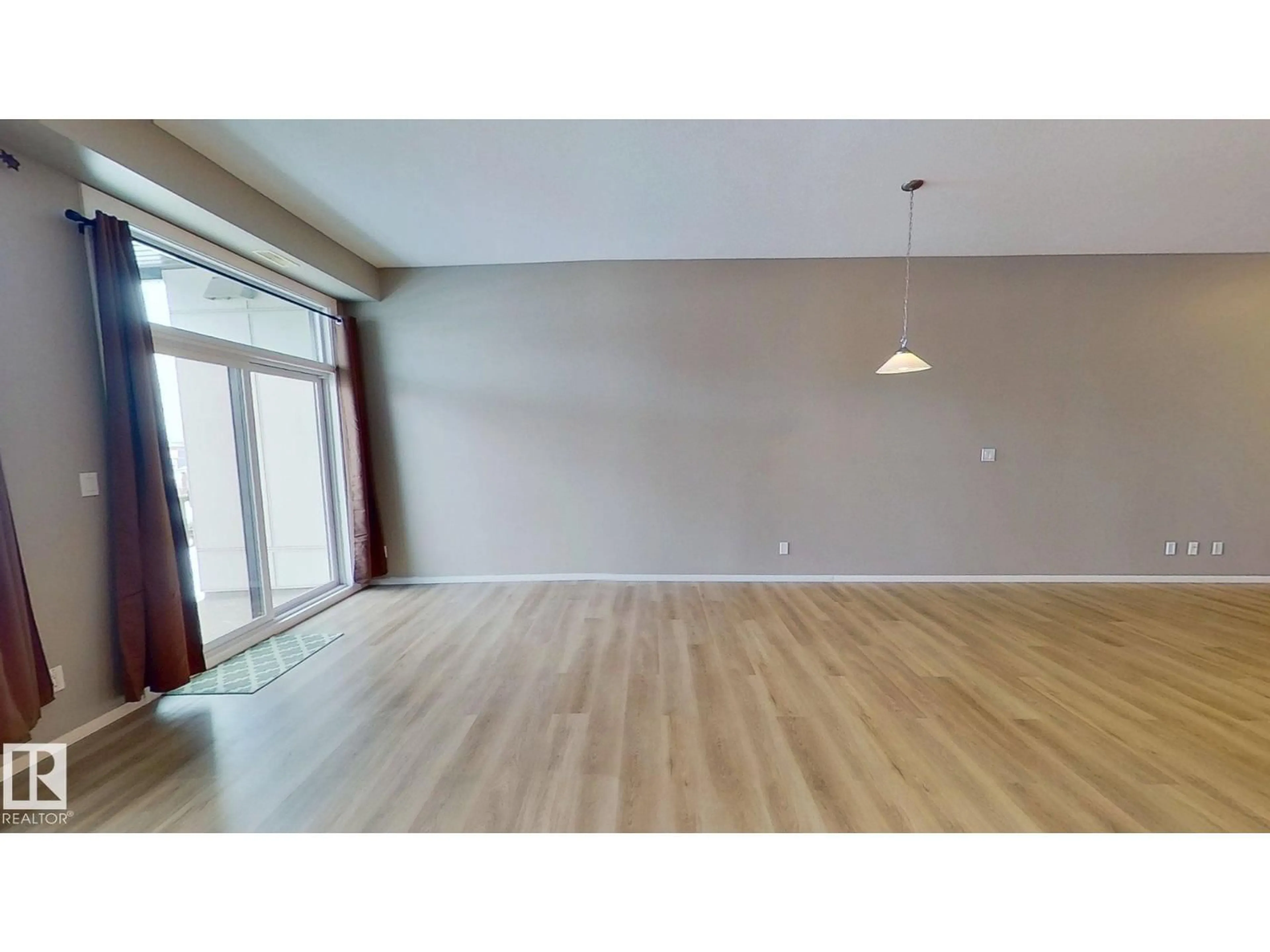 A pic of a room for #215 - 10531 117 ST, Edmonton Alberta T5H0A8