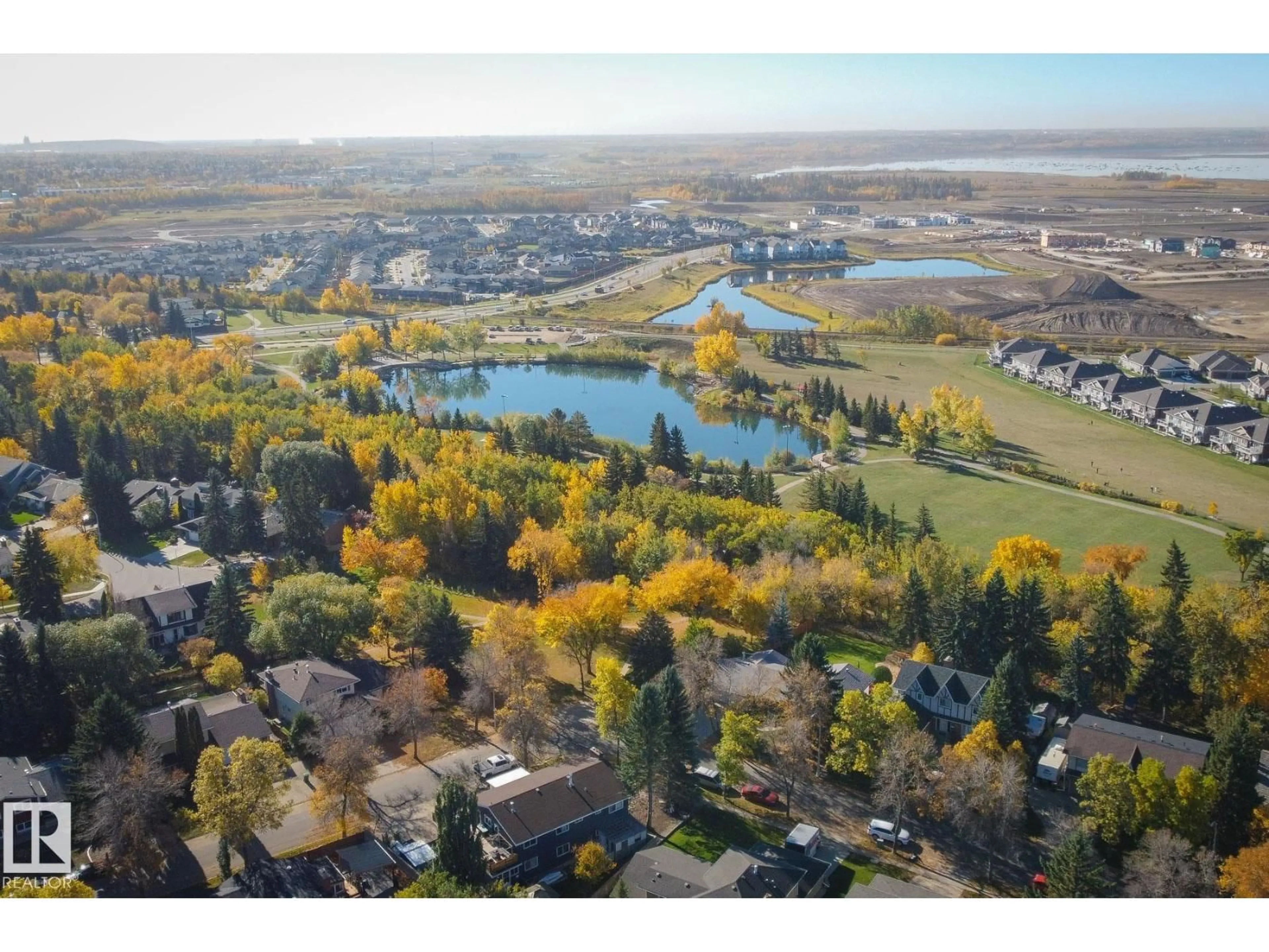 A pic from outside/outdoor area/front of a property/back of a property/a pic from drone, water/lake/river/ocean view for 38 LANCASTER CR, St. Albert Alberta T8N2N8