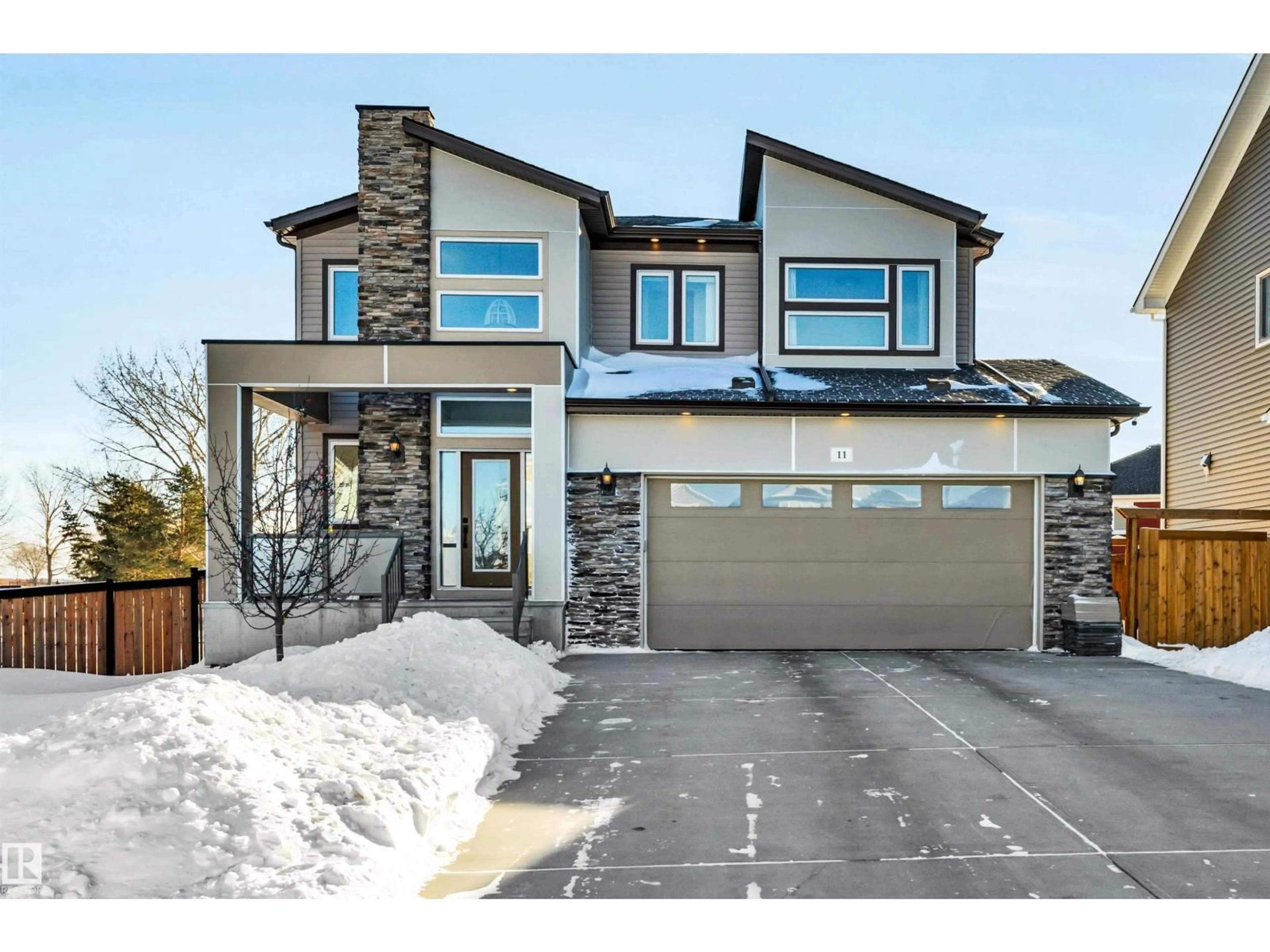 Home with brick exterior material, street for 11 PROMENADE PT, Beaumont Alberta T4X2C9