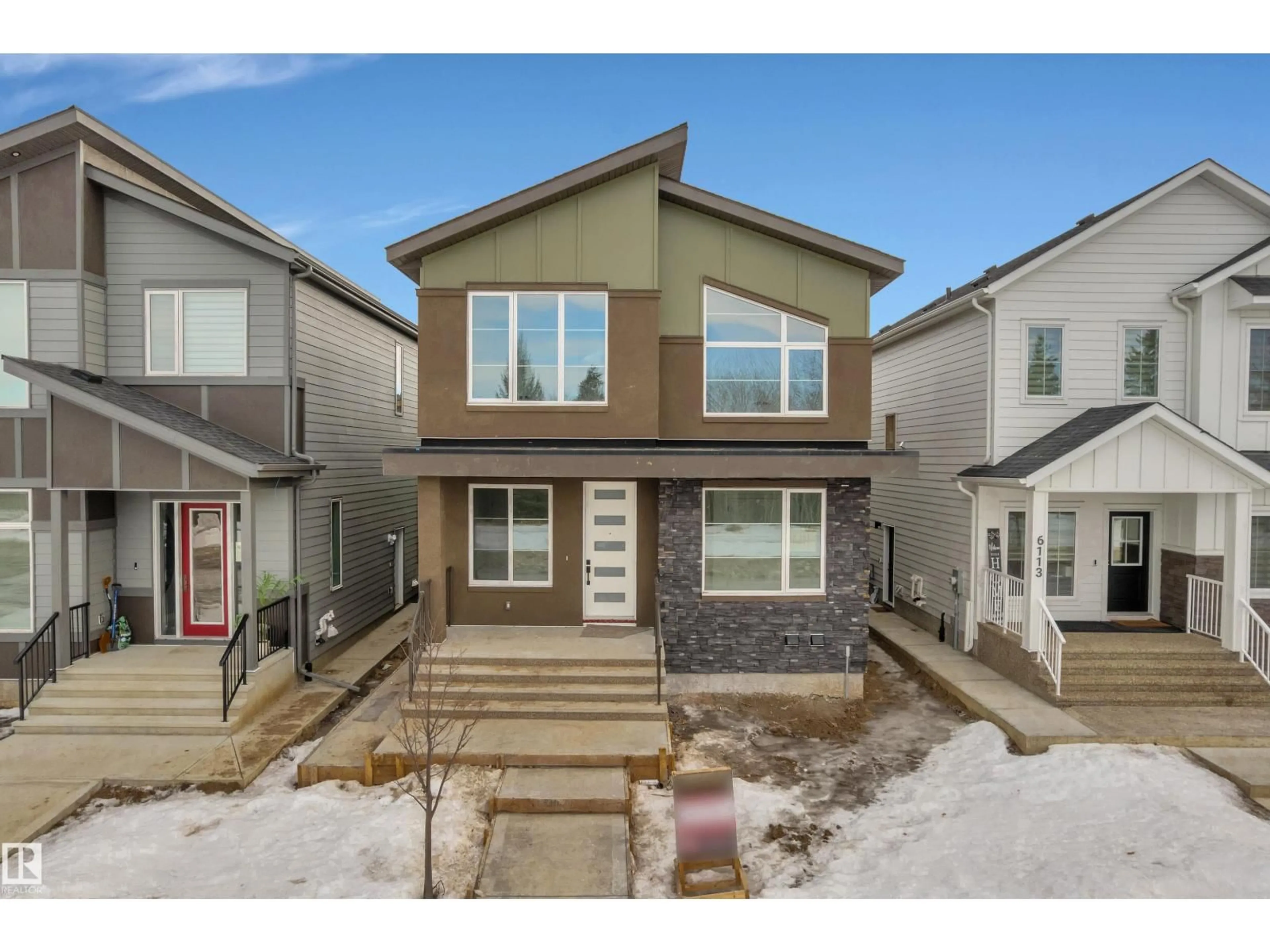 Home with vinyl exterior material, street for 6111 CRAWFORD DR, Edmonton Alberta T6W4L7