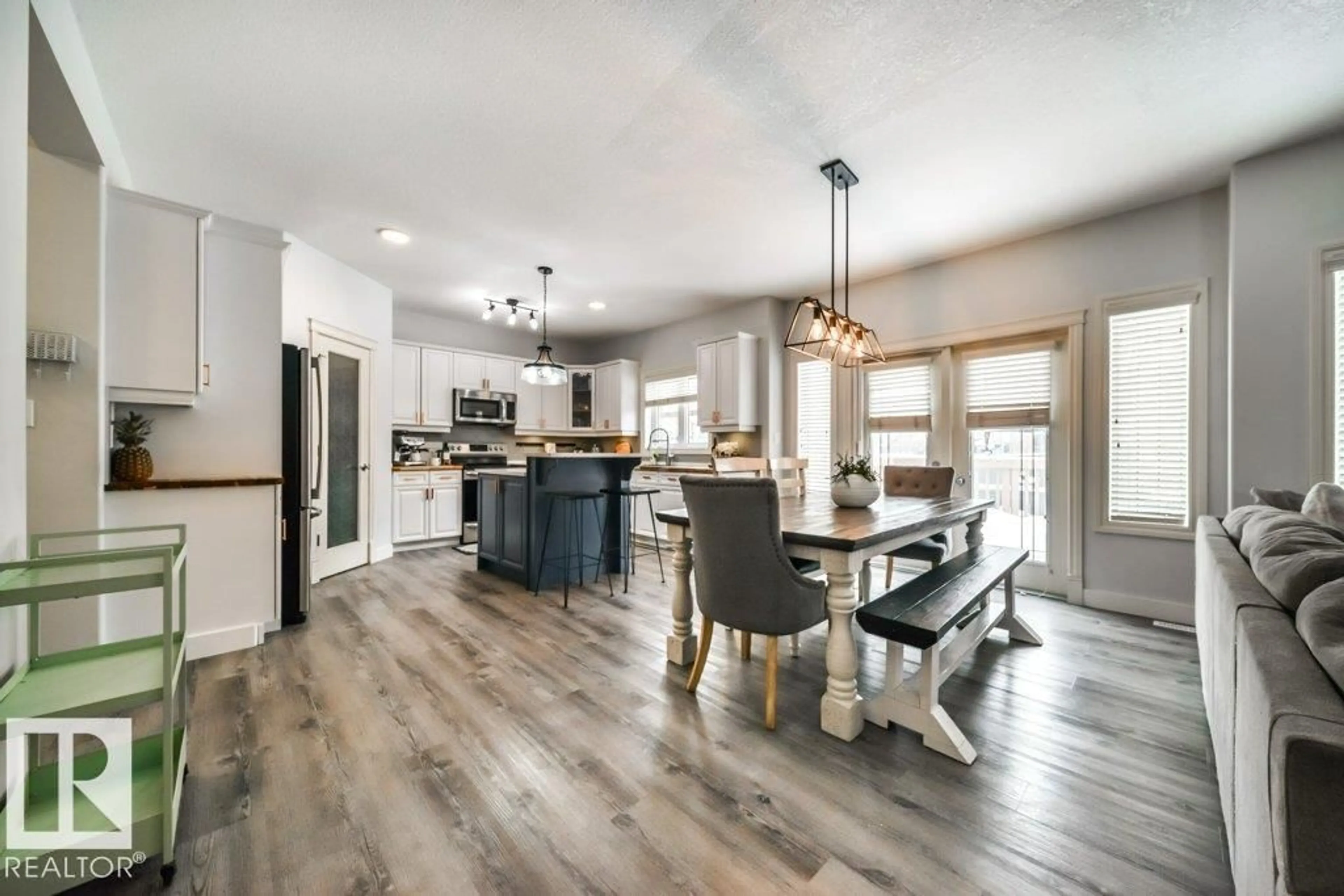 Open concept kitchen, wood/laminate floor for 5211 CERCLE CIEL, Beaumont Alberta T4X1W5