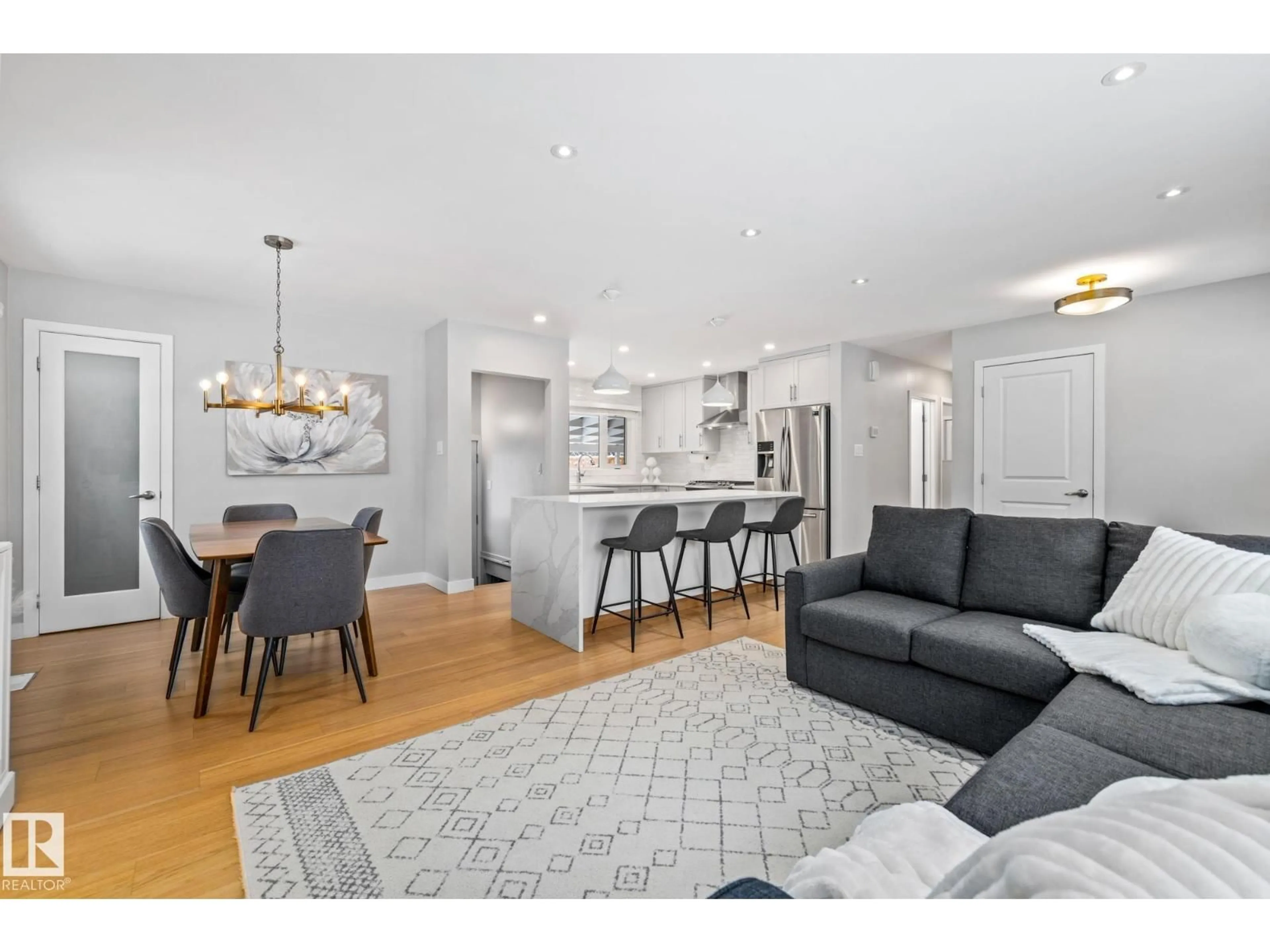 Open concept kitchen, wood/laminate floor for 7622 153 ST, Edmonton Alberta T5R1N4