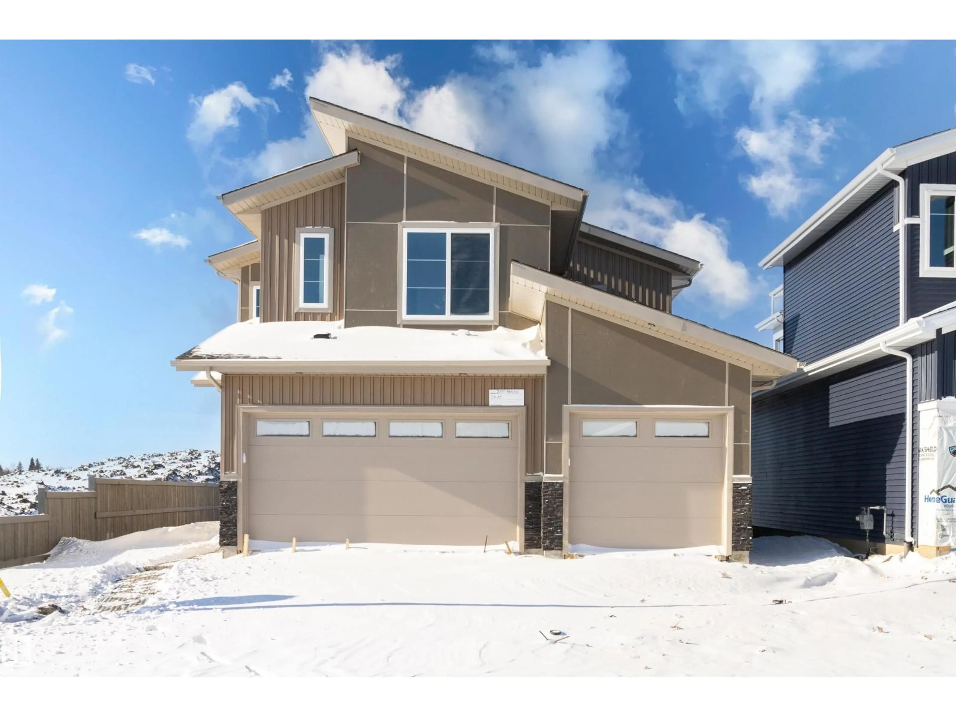 Home with vinyl exterior material, street for 200 BASIN CO, Leduc Alberta T9E1T6