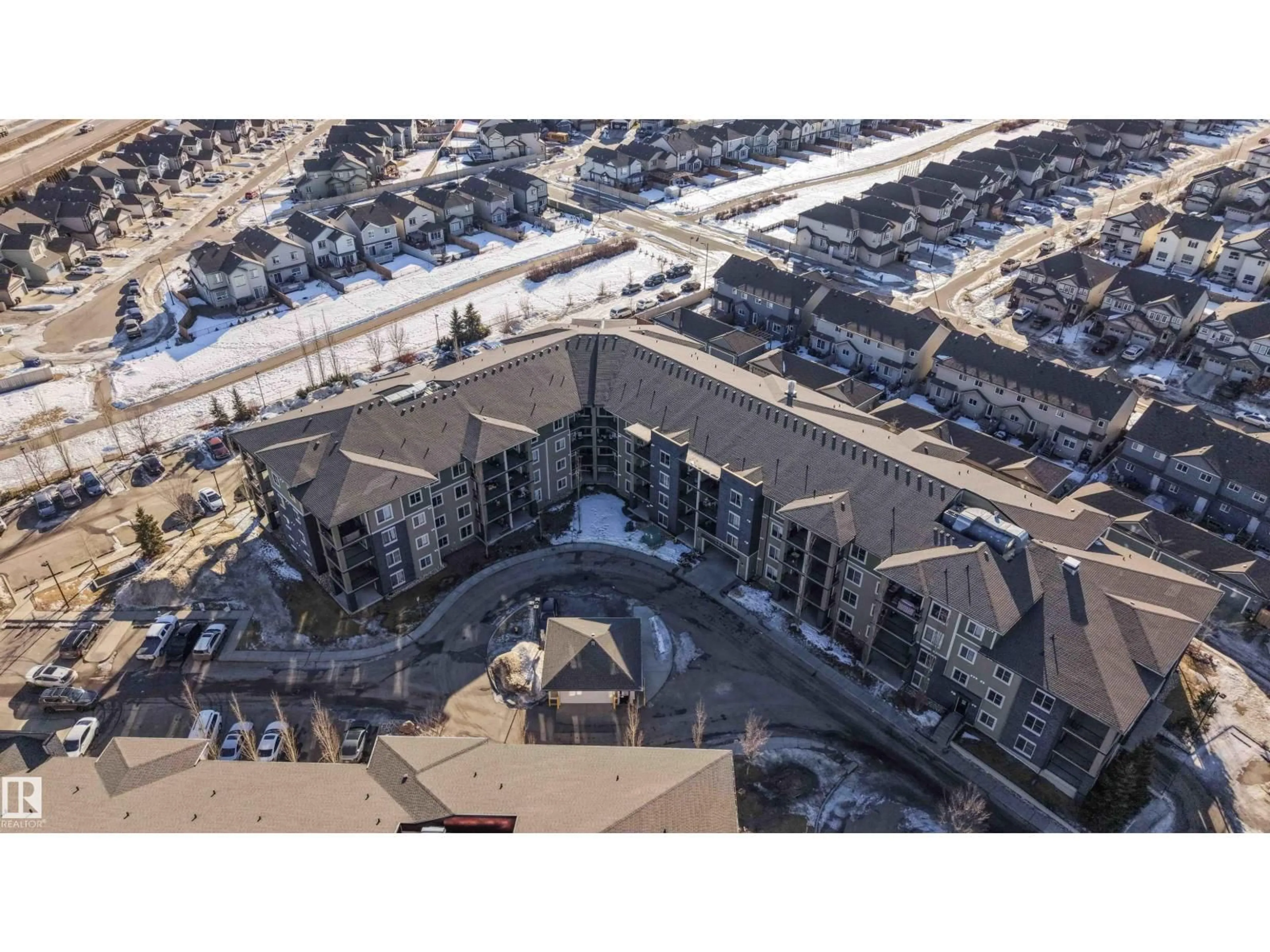 A pic from outside/outdoor area/front of a property/back of a property/a pic from drone, unknown for 415 111 WATT CM, Edmonton Alberta T6X2C6