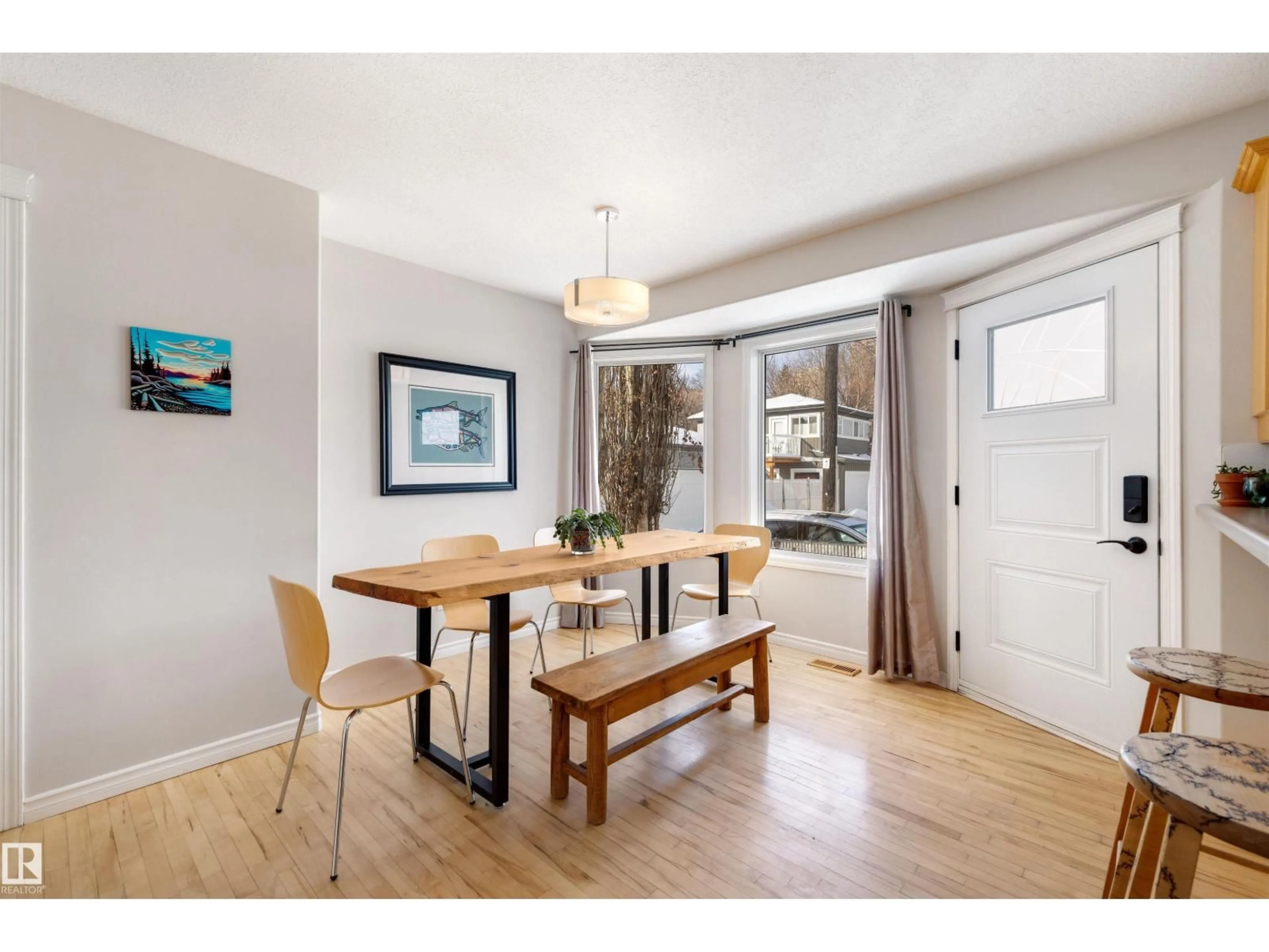 Dining room, wood/laminate floor for 8818 ROWLAND RD, Edmonton Alberta T5H3W4