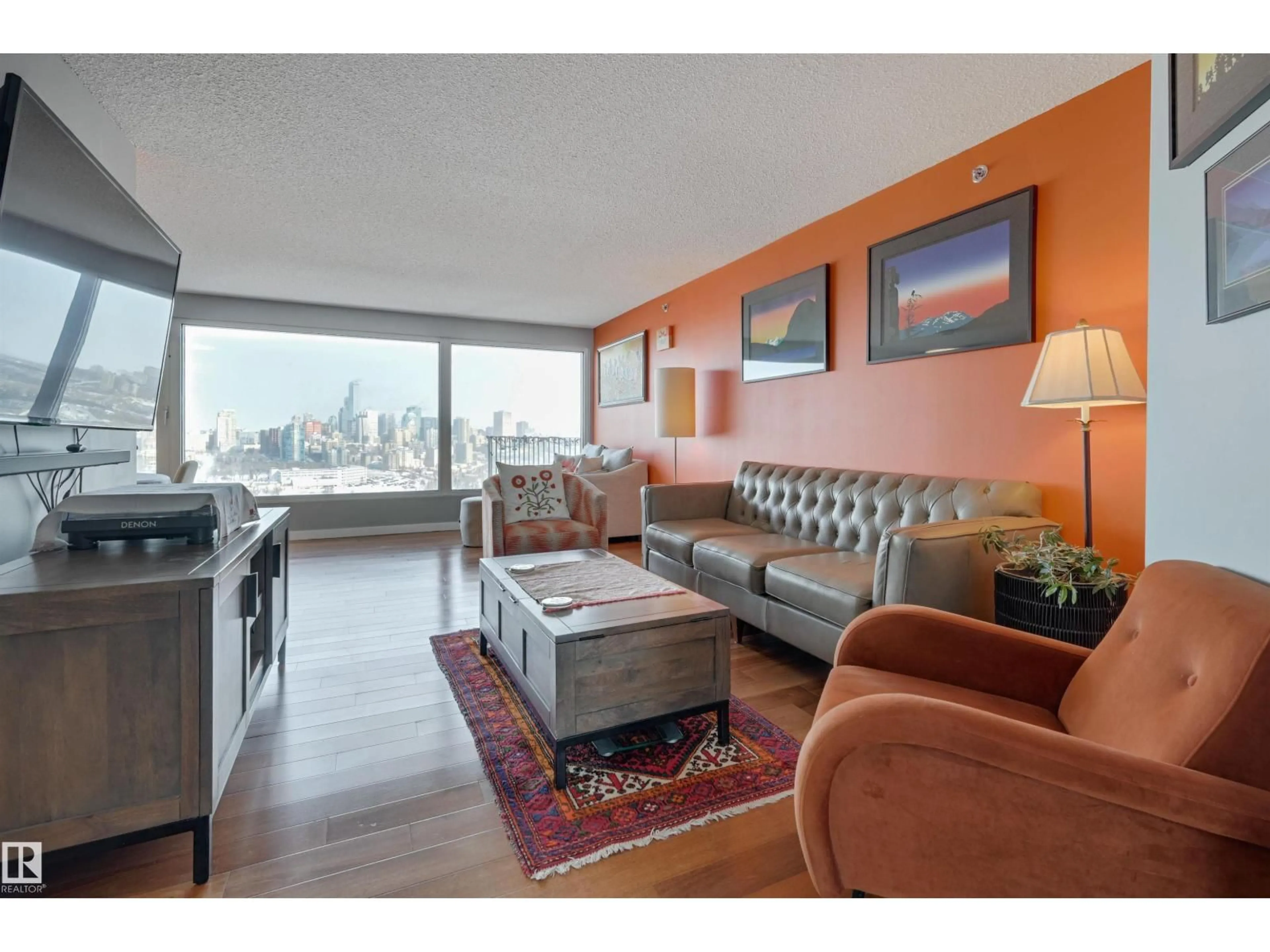 Living room with furniture, wood/laminate floor for 1302 SASKATCHEWAN DR, Edmonton Alberta T6E6J5