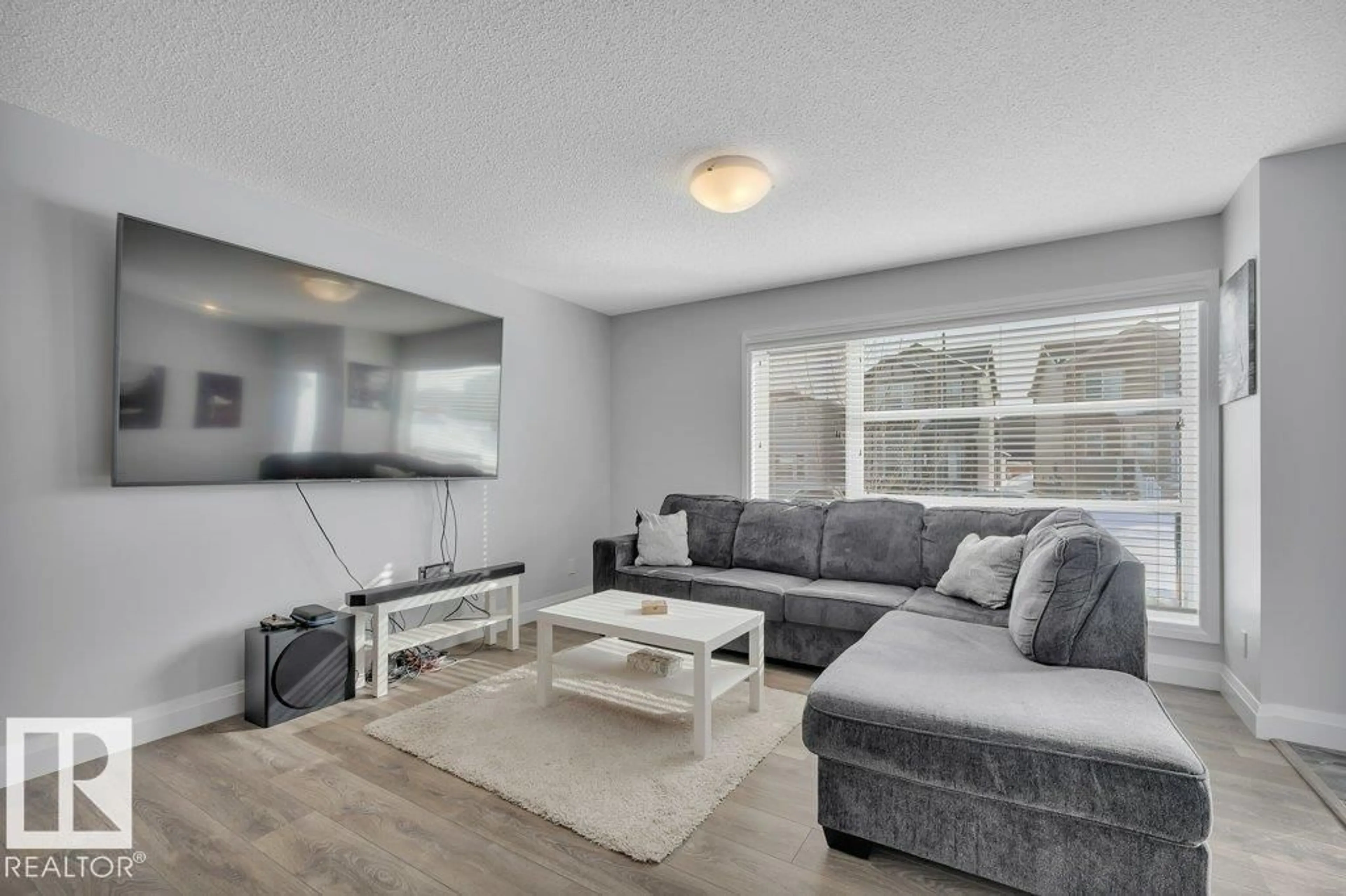 Living room with furniture, unknown for 274 CHARLESWORTH DR, Edmonton Alberta T6K2J3