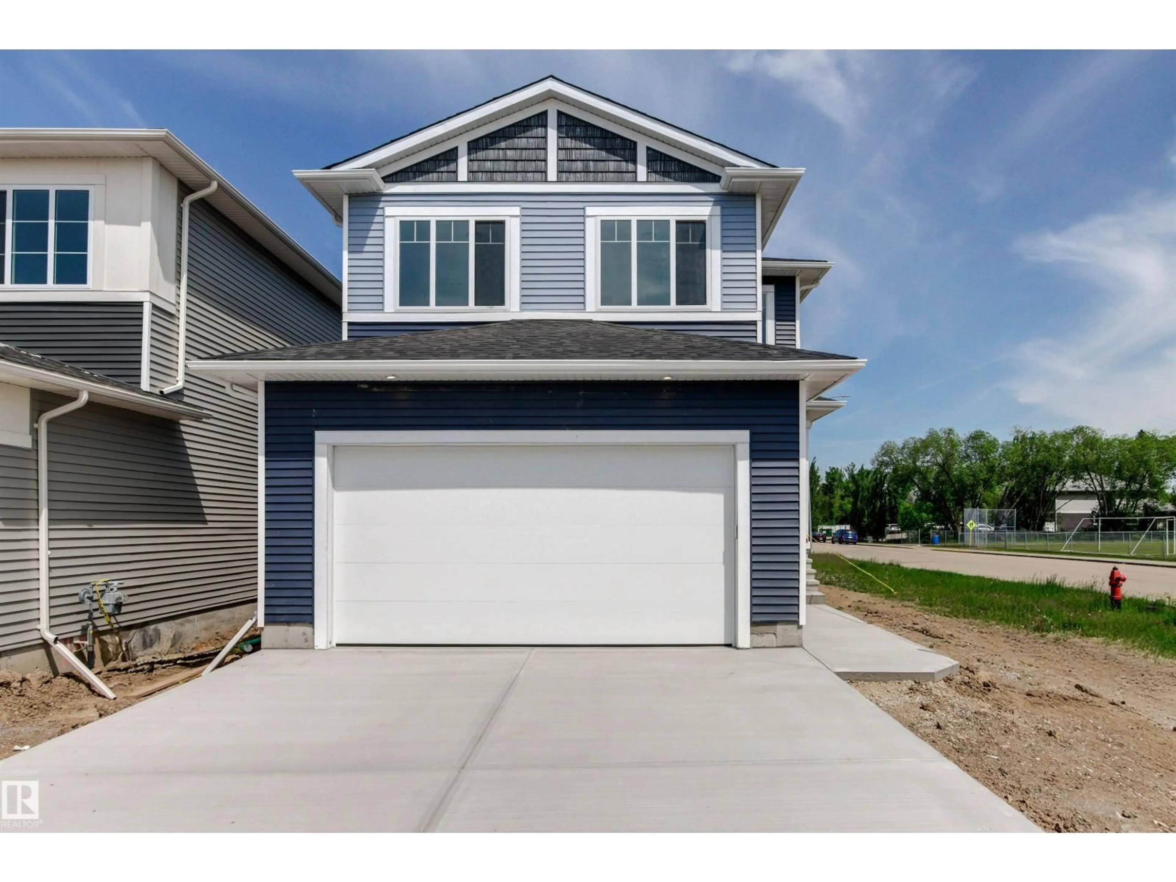 Home with vinyl exterior material, street for 5002 53 AVE, Calmar Alberta T0C0V0