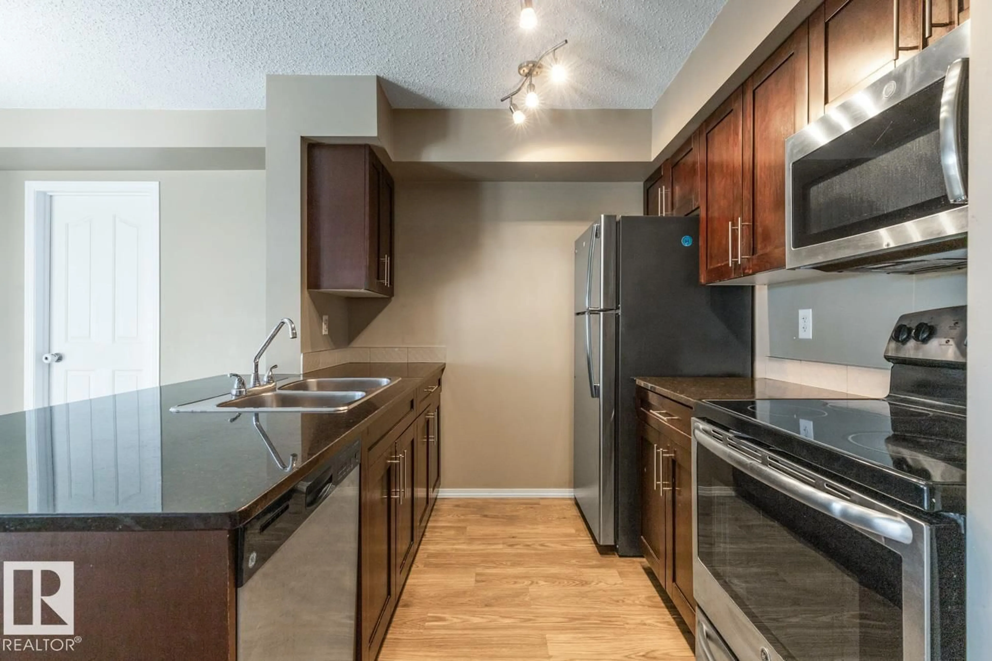 Standard kitchen, unknown for #117 MCCONACHIE DR, Edmonton Alberta T5Y3N4