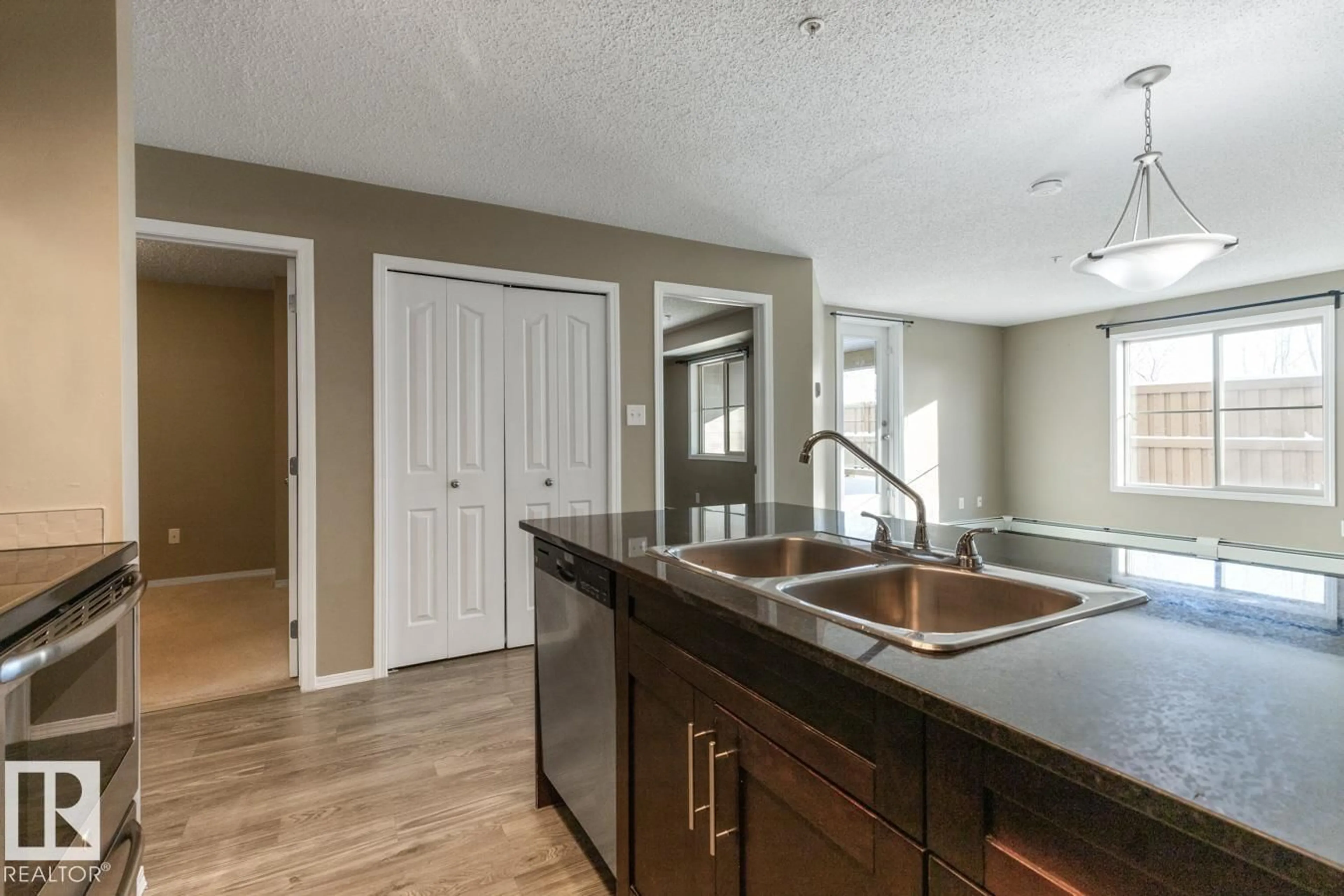Open concept kitchen, unknown for #117 MCCONACHIE DR, Edmonton Alberta T5Y3N4