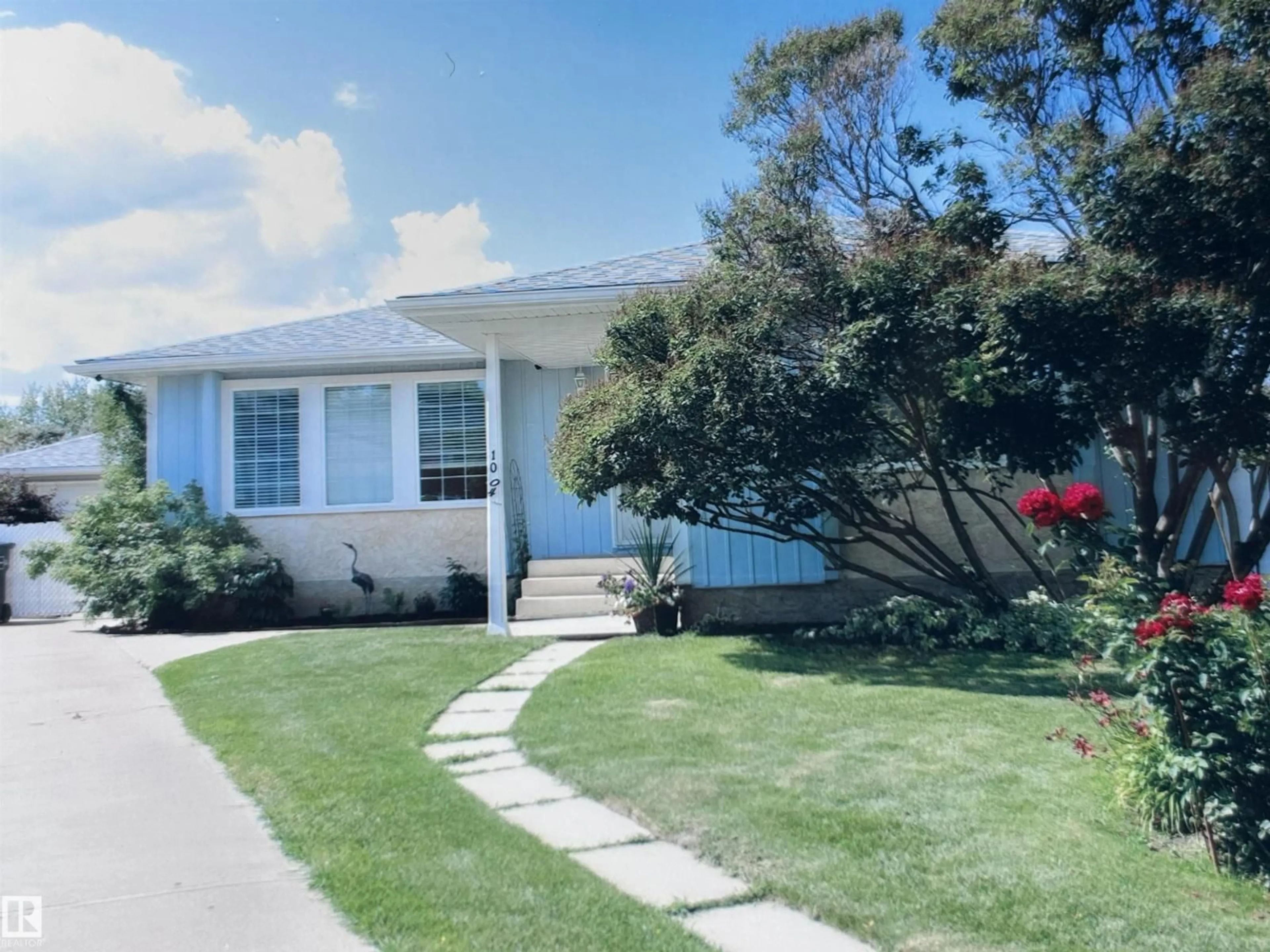 Home with vinyl exterior material, street for 1004 61 ST, Edmonton Alberta T6L2G5