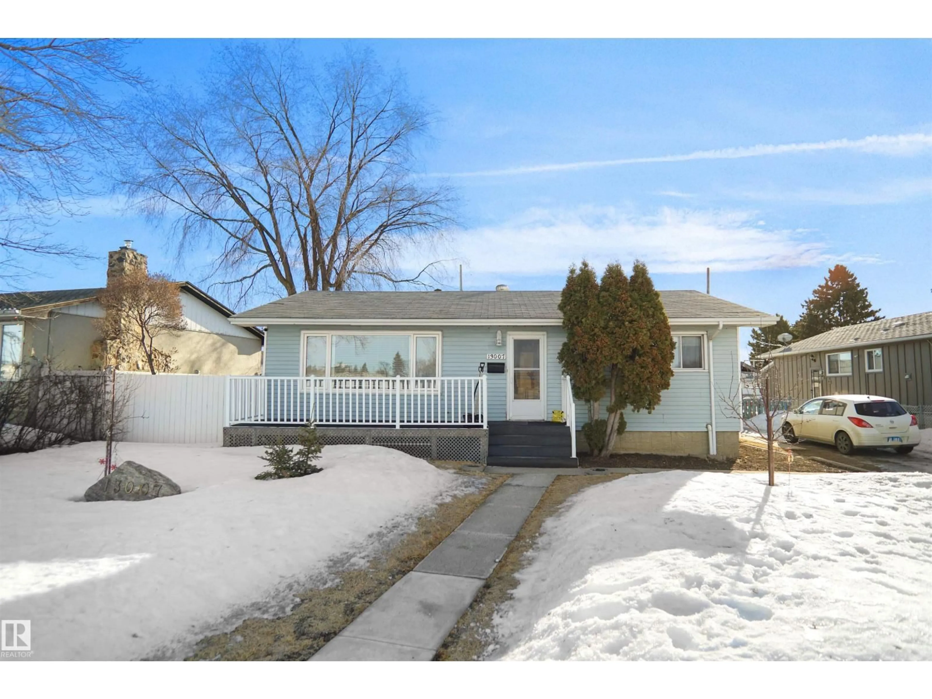 Home with vinyl exterior material, street for NW - 13007 93 ST, Edmonton Alberta T5E3T3