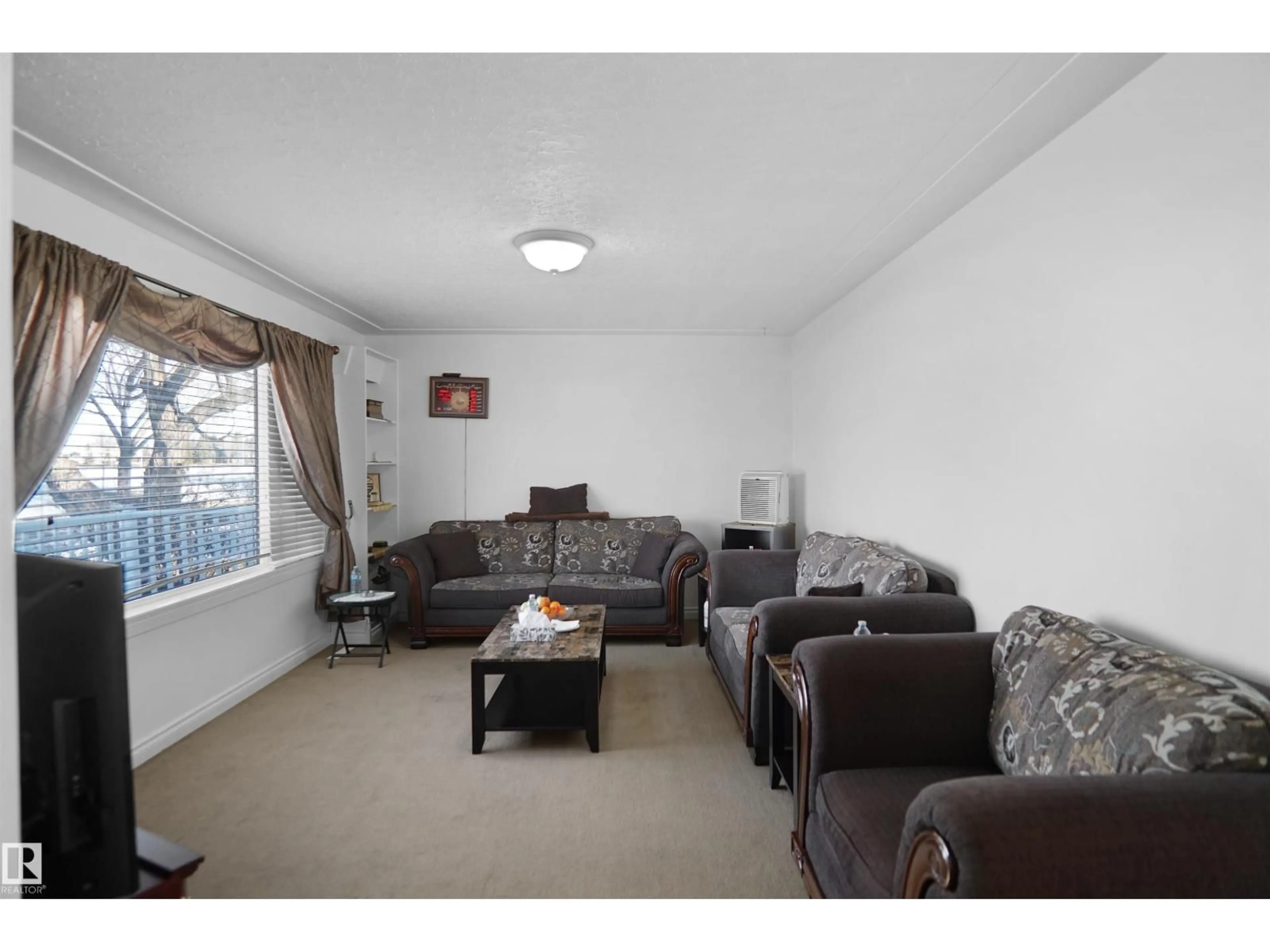 Living room with furniture, unknown for NW - 13007 93 ST, Edmonton Alberta T5E3T3