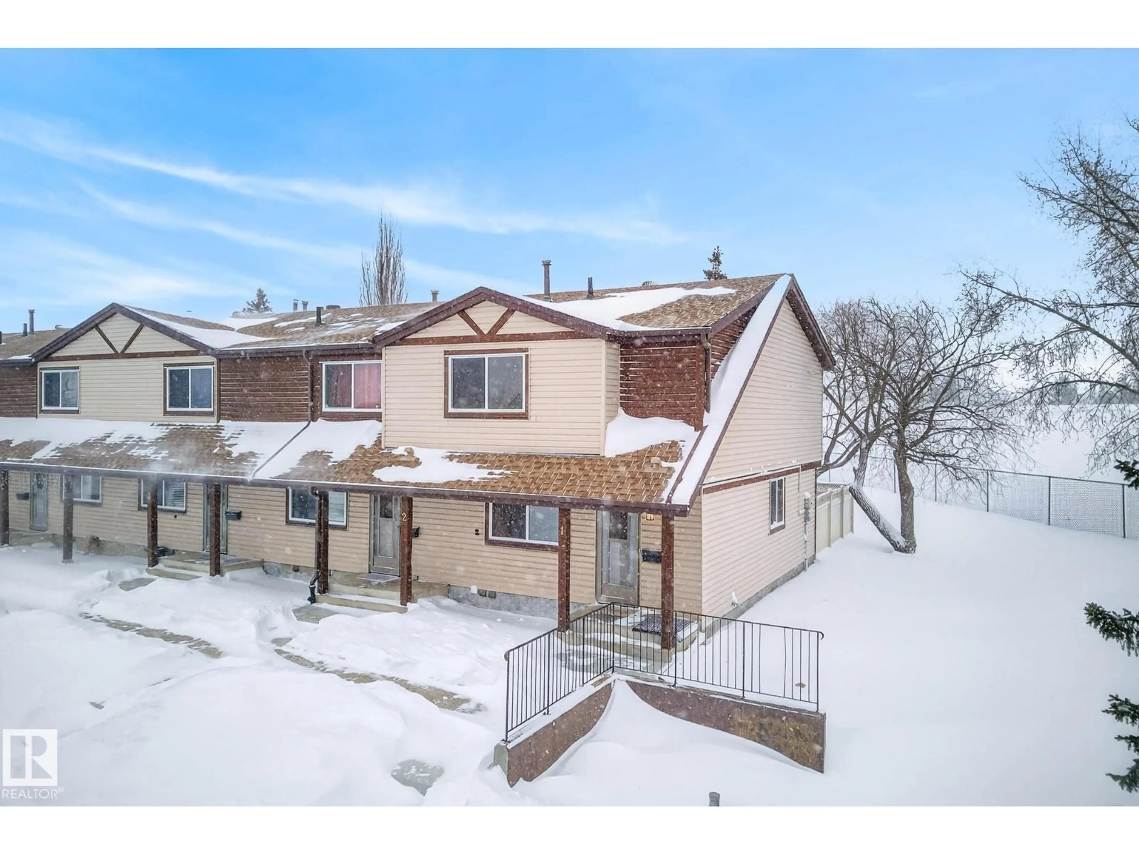 A pic from outside/outdoor area/front of a property/back of a property/a pic from drone, street for 13833 30 ST, Edmonton Alberta T5Y2B2