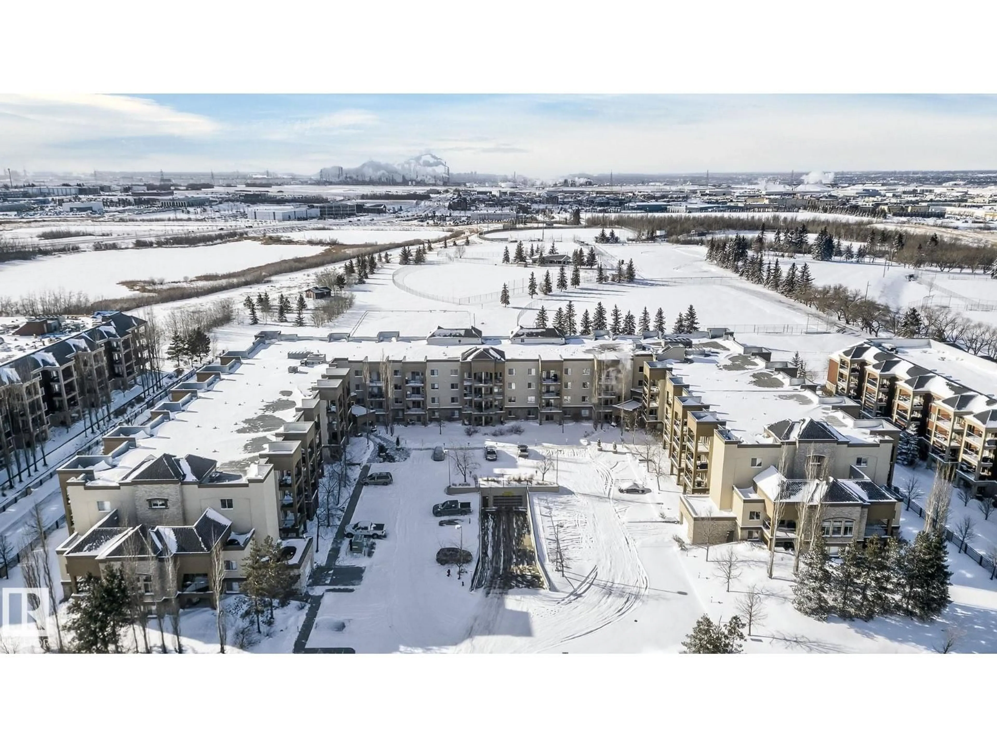 A pic from outside/outdoor area/front of a property/back of a property/a pic from drone, mountain view for 222 400 PALISADES WY, Sherwood Park Alberta T8H0H4