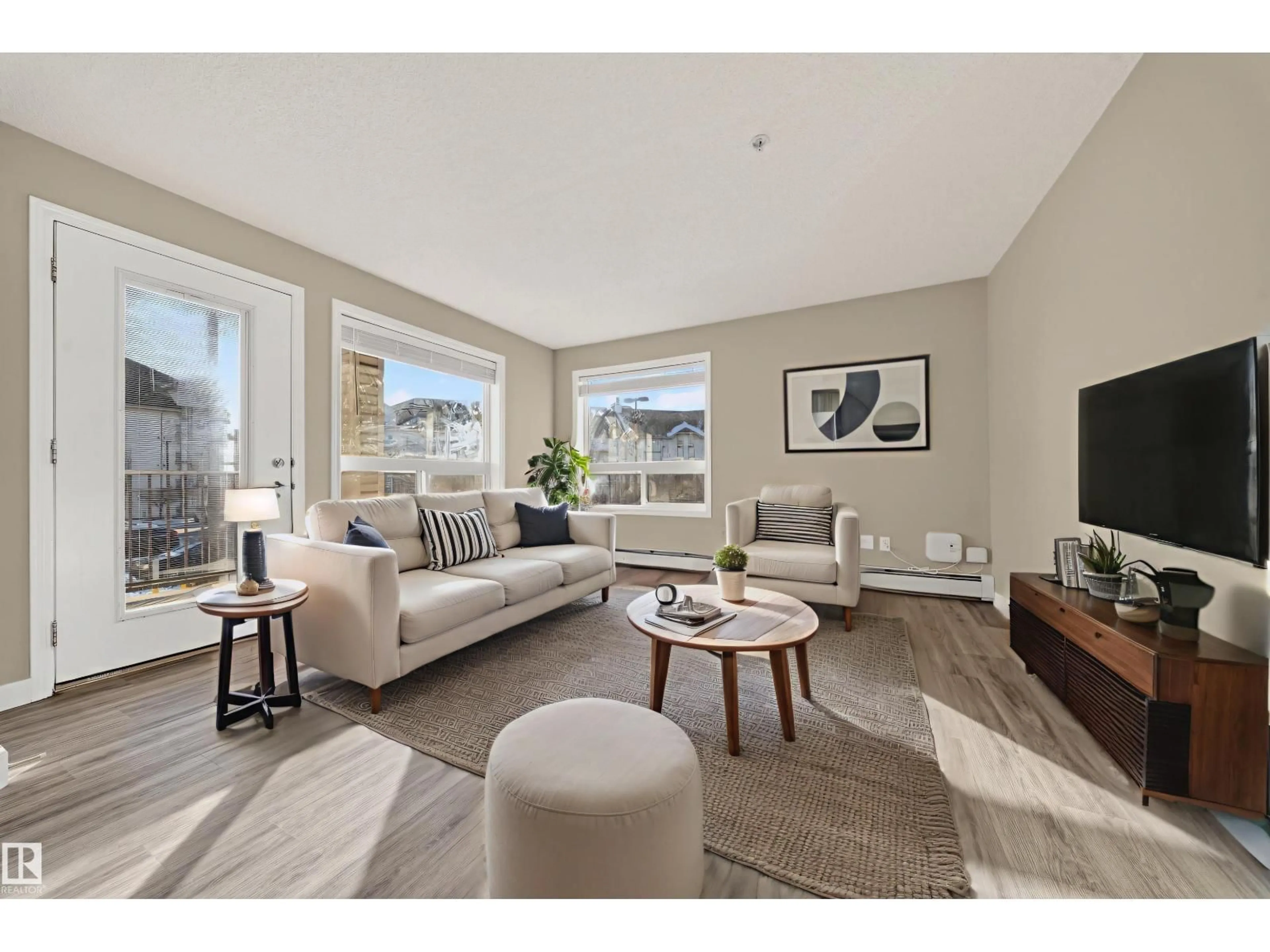 Living room with furniture, unknown for #1205 - 1205 CLAREVIEW STATION DR DR, Edmonton Alberta T5Y0E6