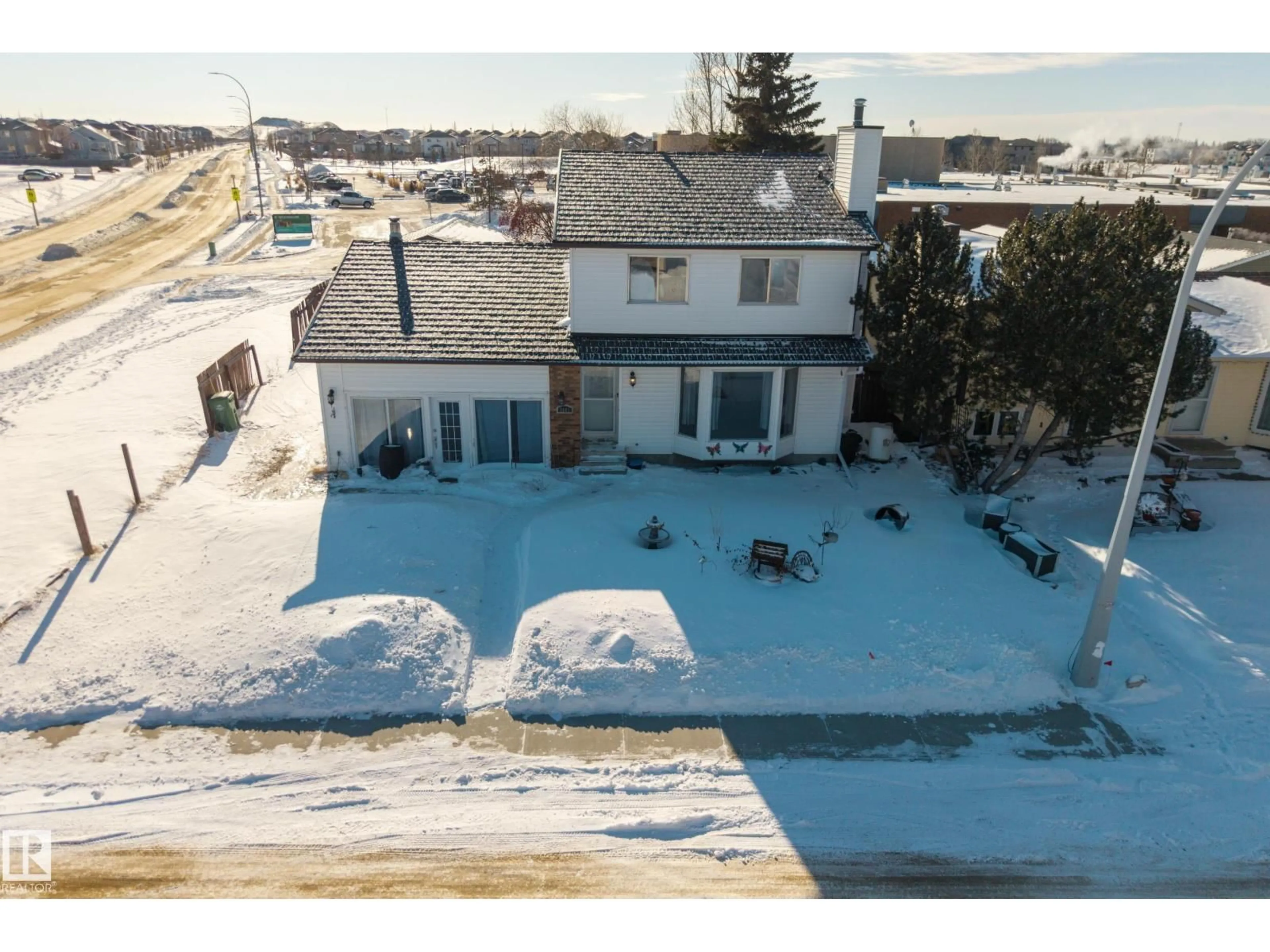 A pic from outside/outdoor area/front of a property/back of a property/a pic from drone, street for 3801 33 AV, Leduc Alberta T9E6E5