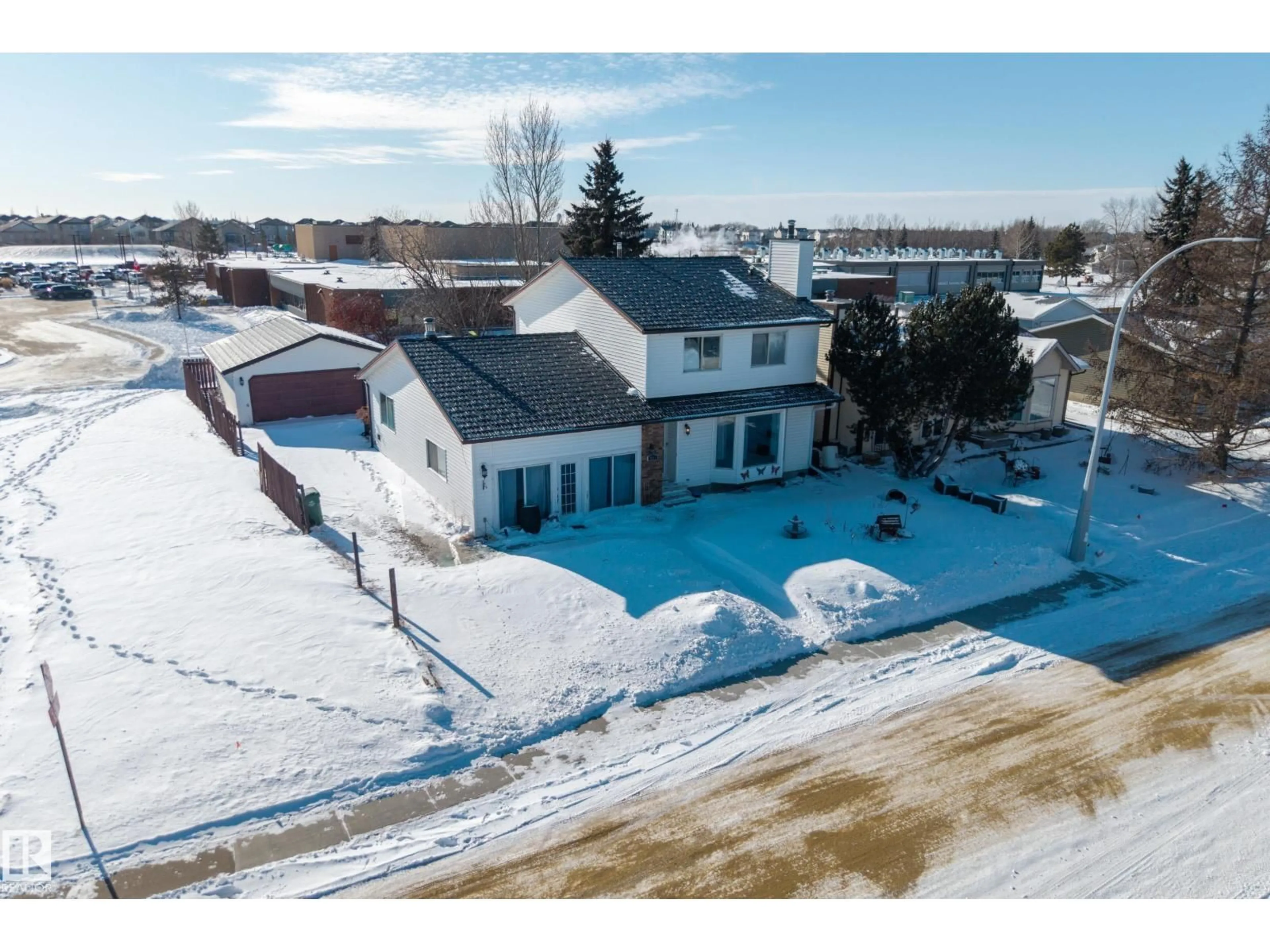 A pic from outside/outdoor area/front of a property/back of a property/a pic from drone, water/lake/river/ocean view for 3801 33 AV, Leduc Alberta T9E6E5