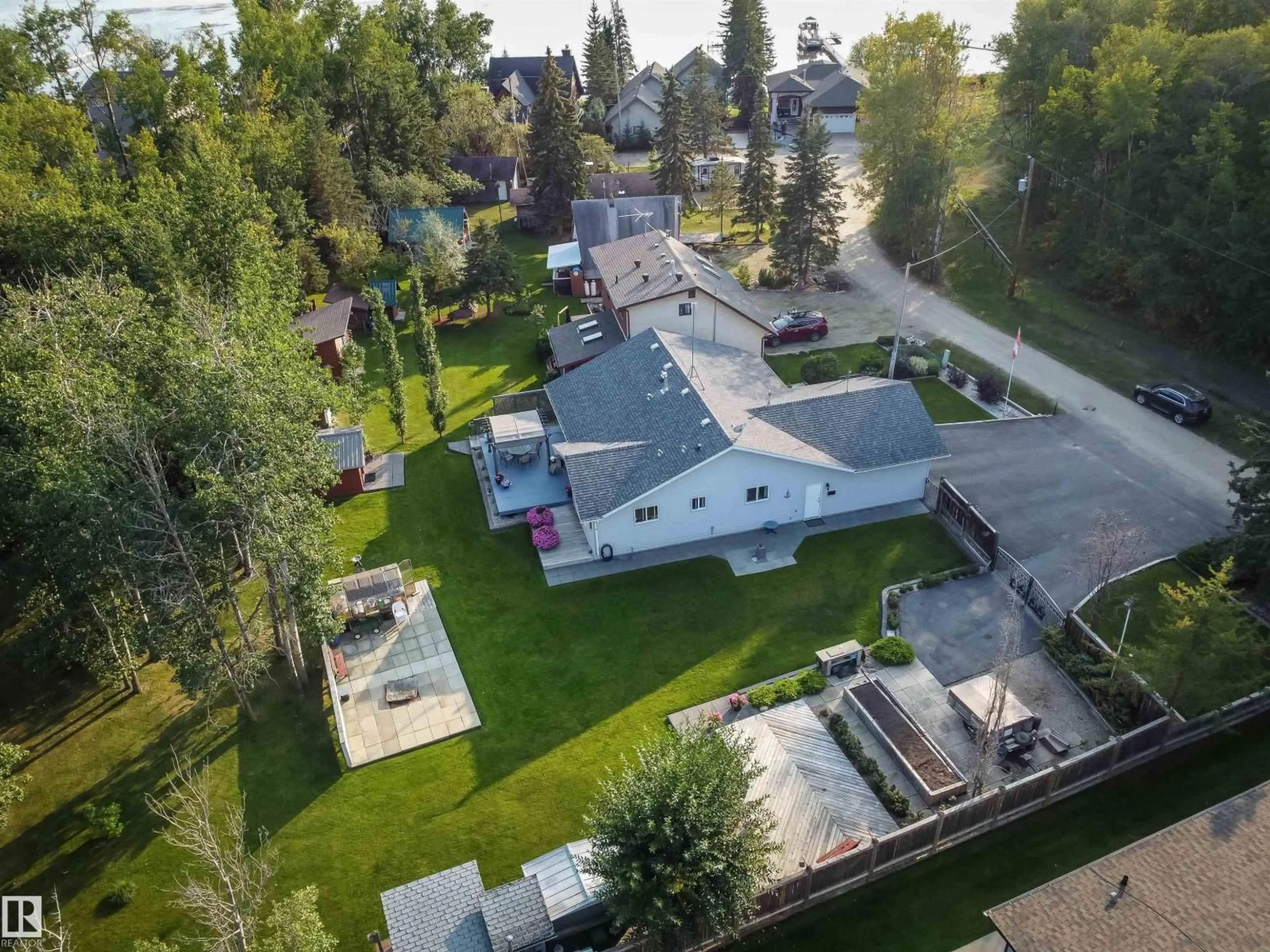 A pic from outside/outdoor area/front of a property/back of a property/a pic from drone, street for 1087 10 ST, Rural Lac Ste. Anne County Alberta T0E1A0