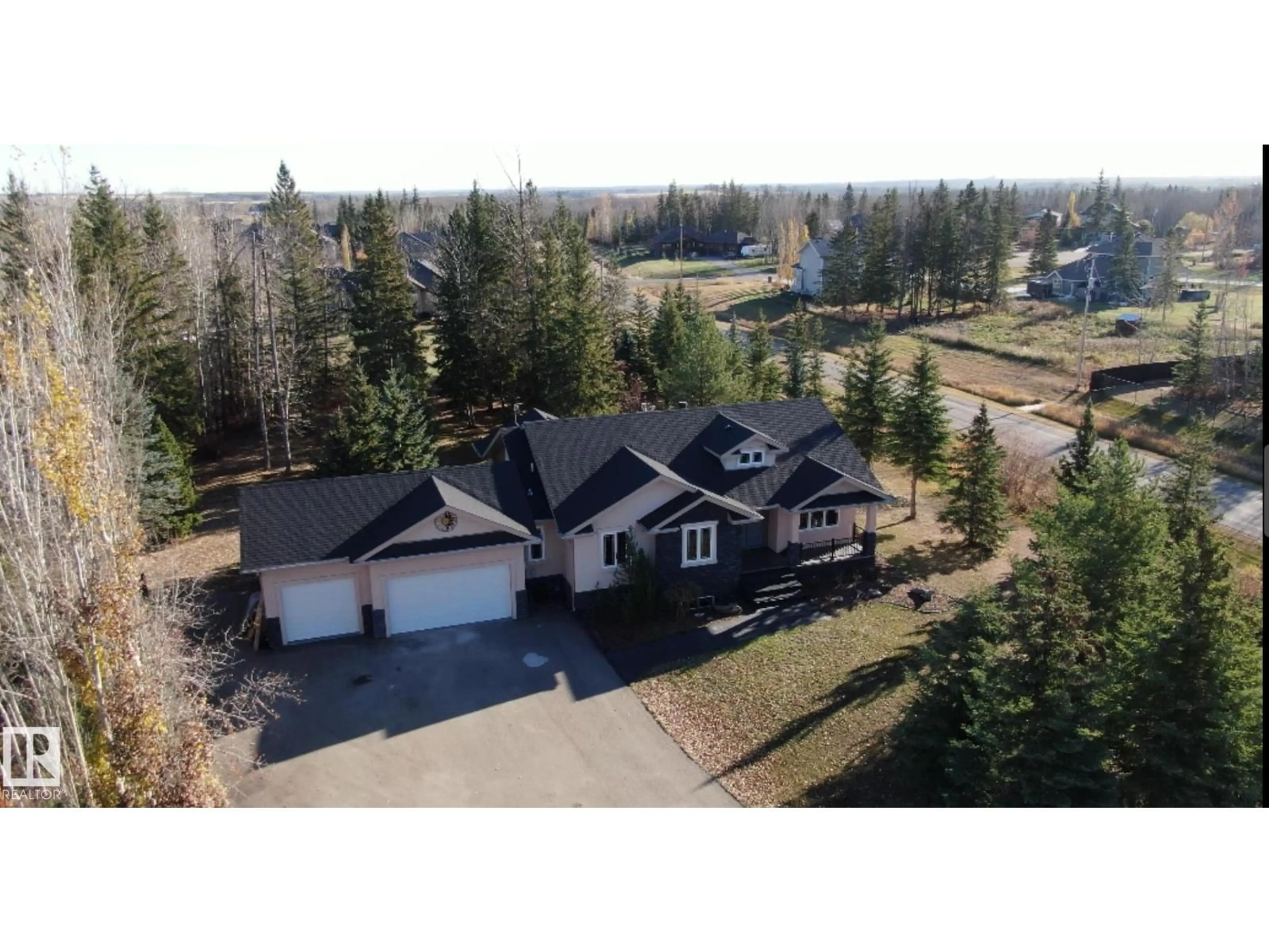 A pic from outside/outdoor area/front of a property/back of a property/a pic from drone, unknown for 86 53305 RGE ROAD 273, Rural Parkland County Alberta T7X3N4