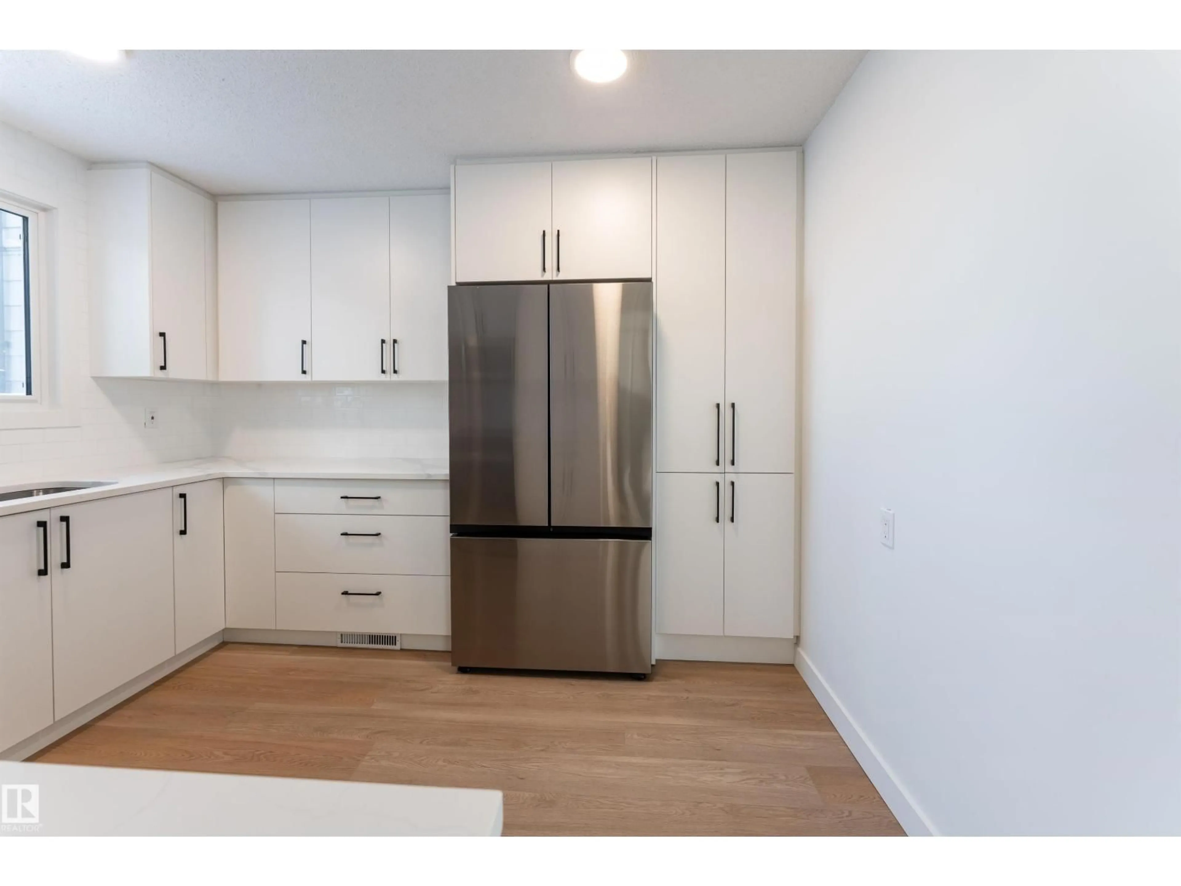 Standard kitchen, wood/laminate floor for 3108 142 AV, Edmonton Alberta T5Y1H2