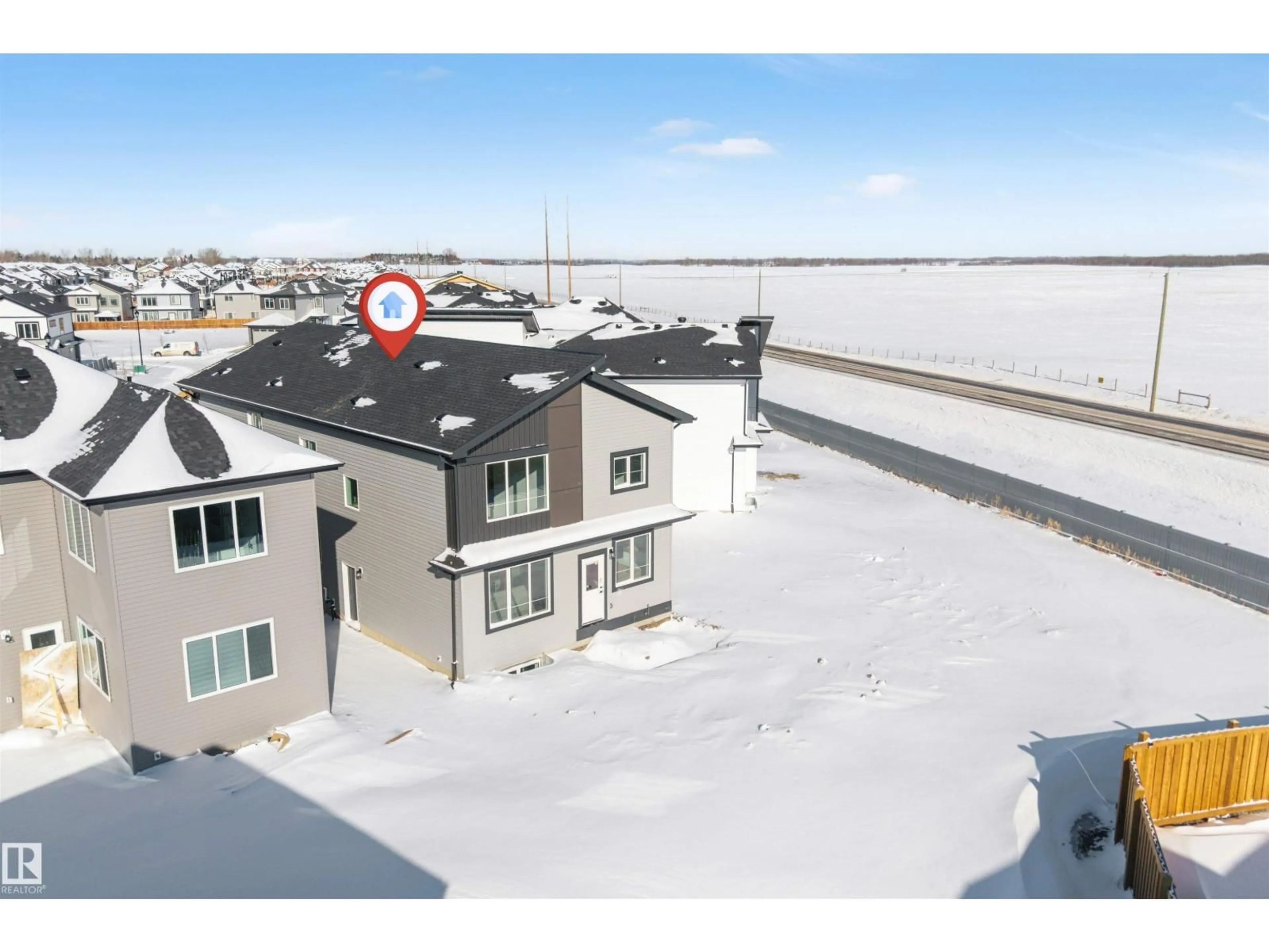 A pic from outside/outdoor area/front of a property/back of a property/a pic from drone, water/lake/river/ocean view for 4401 35 ST, Beaumont Alberta T4X3G9