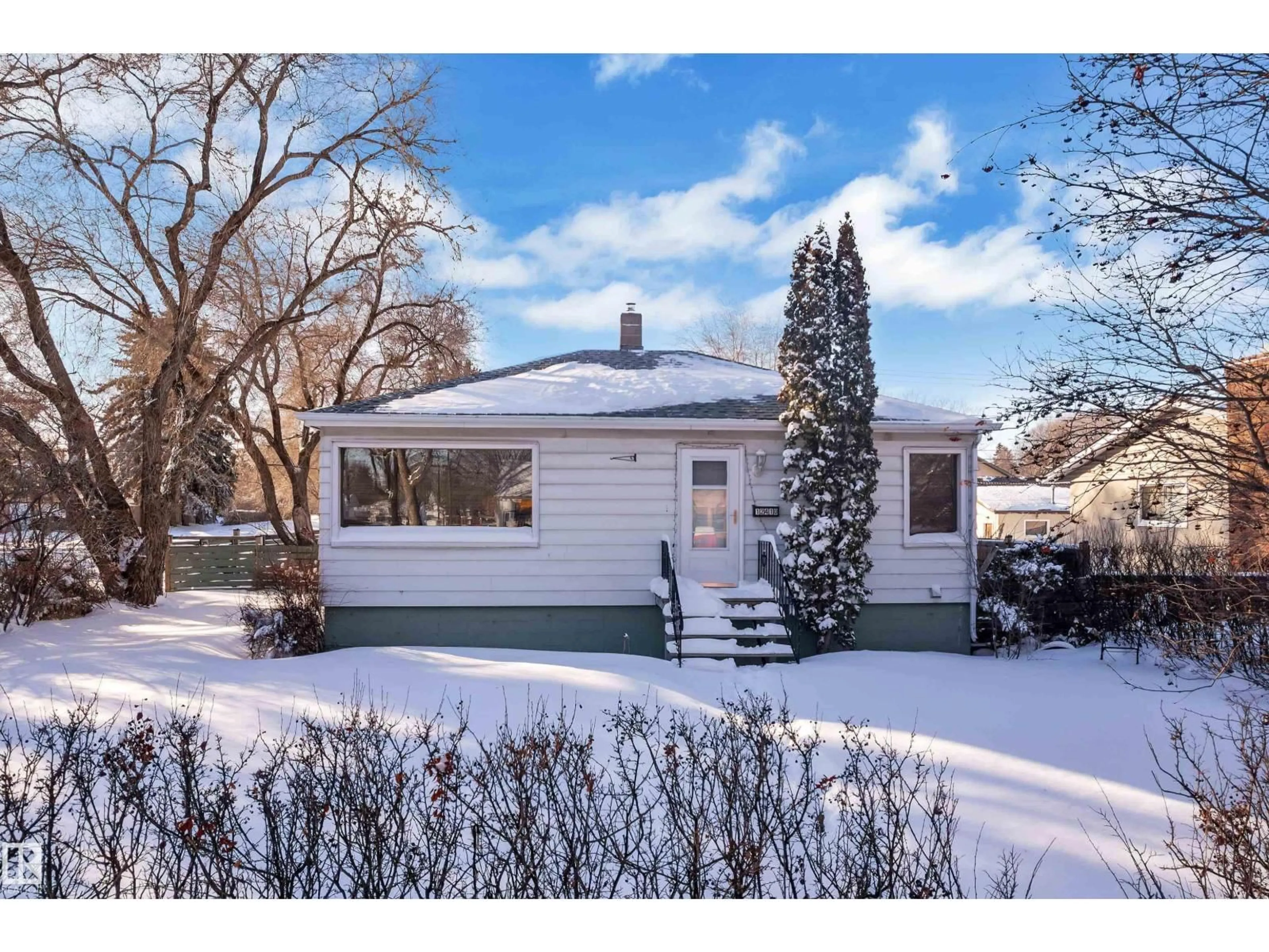 Home with vinyl exterior material, street for NW - 12410 79 ST, Edmonton Alberta T5B2M3