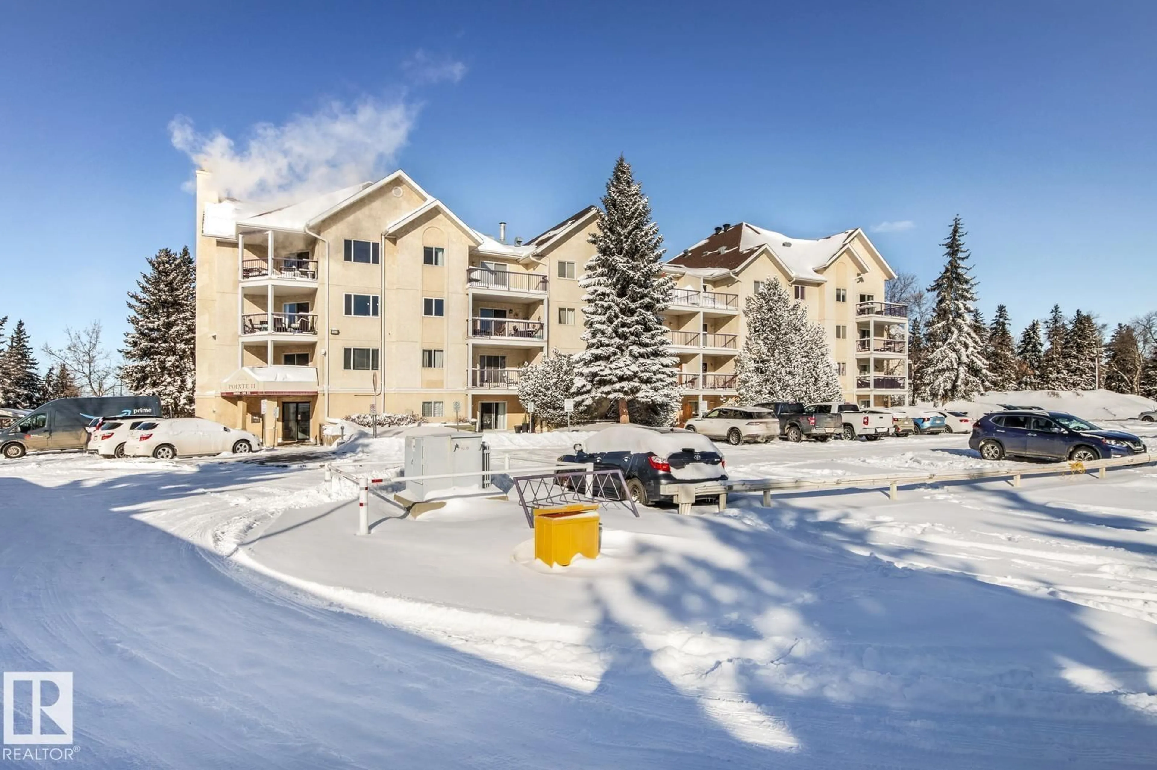 A pic from outside/outdoor area/front of a property/back of a property/a pic from drone, mountain view for #446 - 10636 120 ST NW, Edmonton Alberta T5H4L5