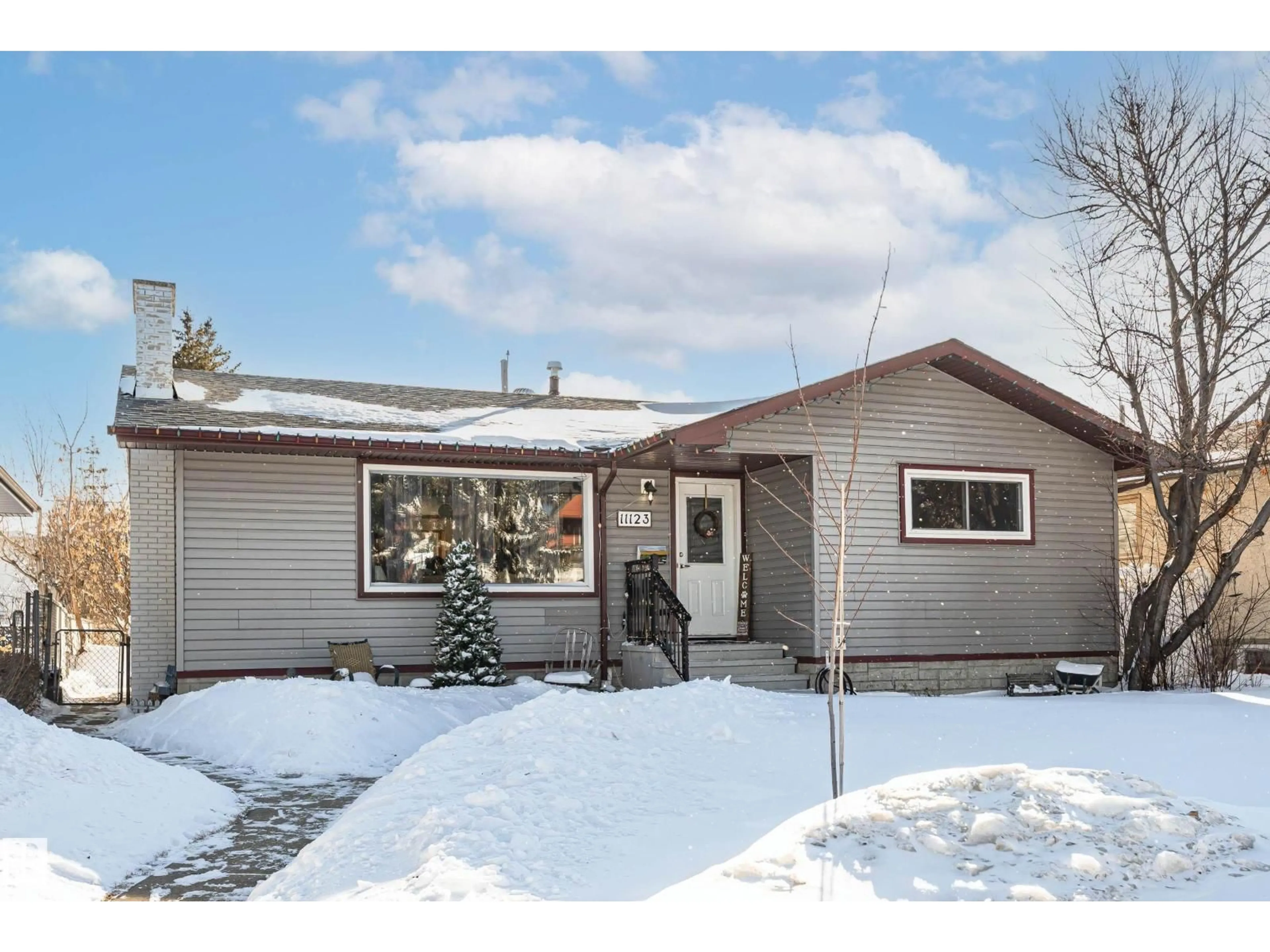 Home with vinyl exterior material, street for 11123 50 AV, Edmonton Alberta T6H0J1