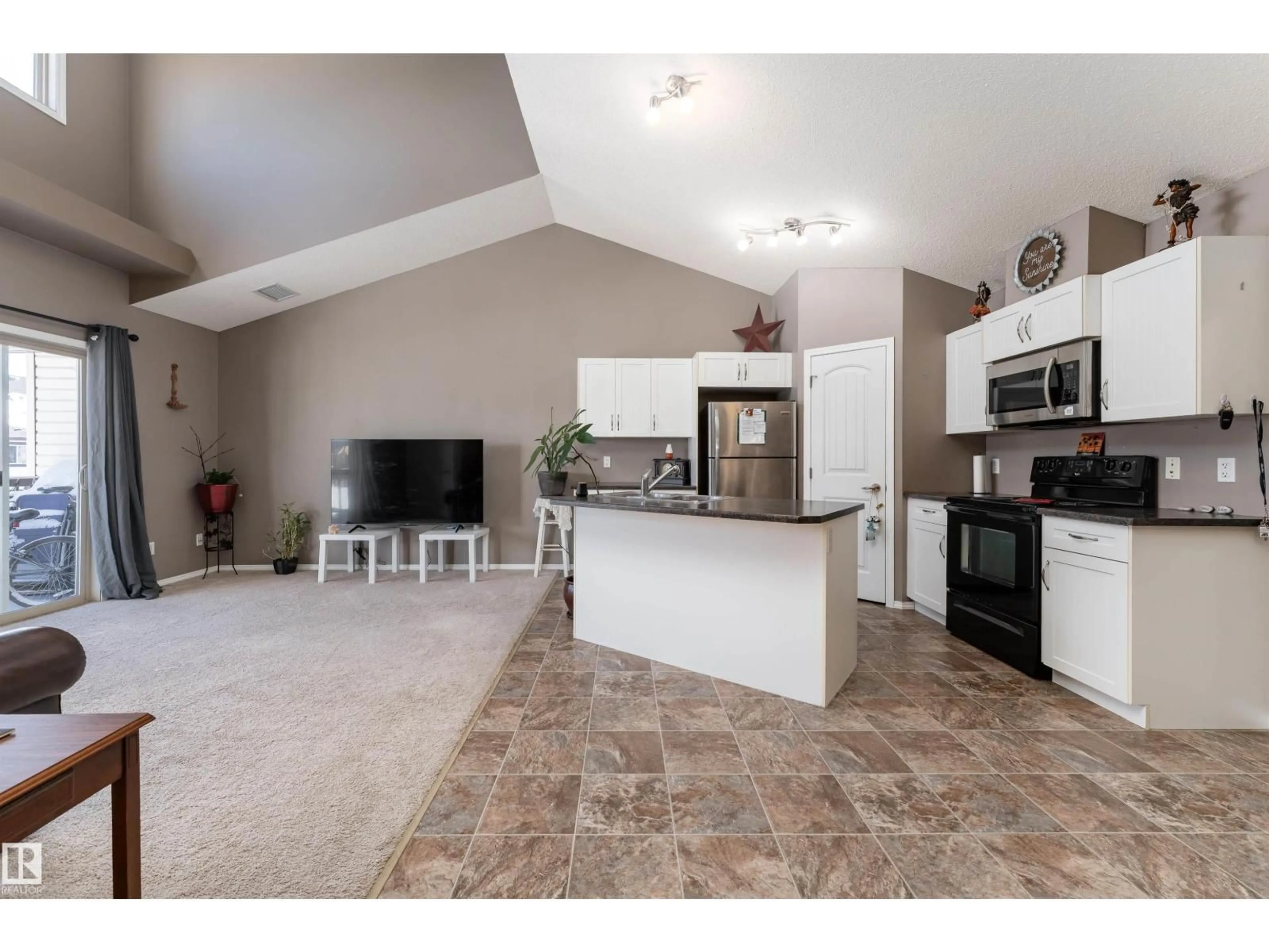 Open concept kitchen, ceramic/tile floor for SW - 82 604 62 ST, Edmonton Alberta T6X0K4