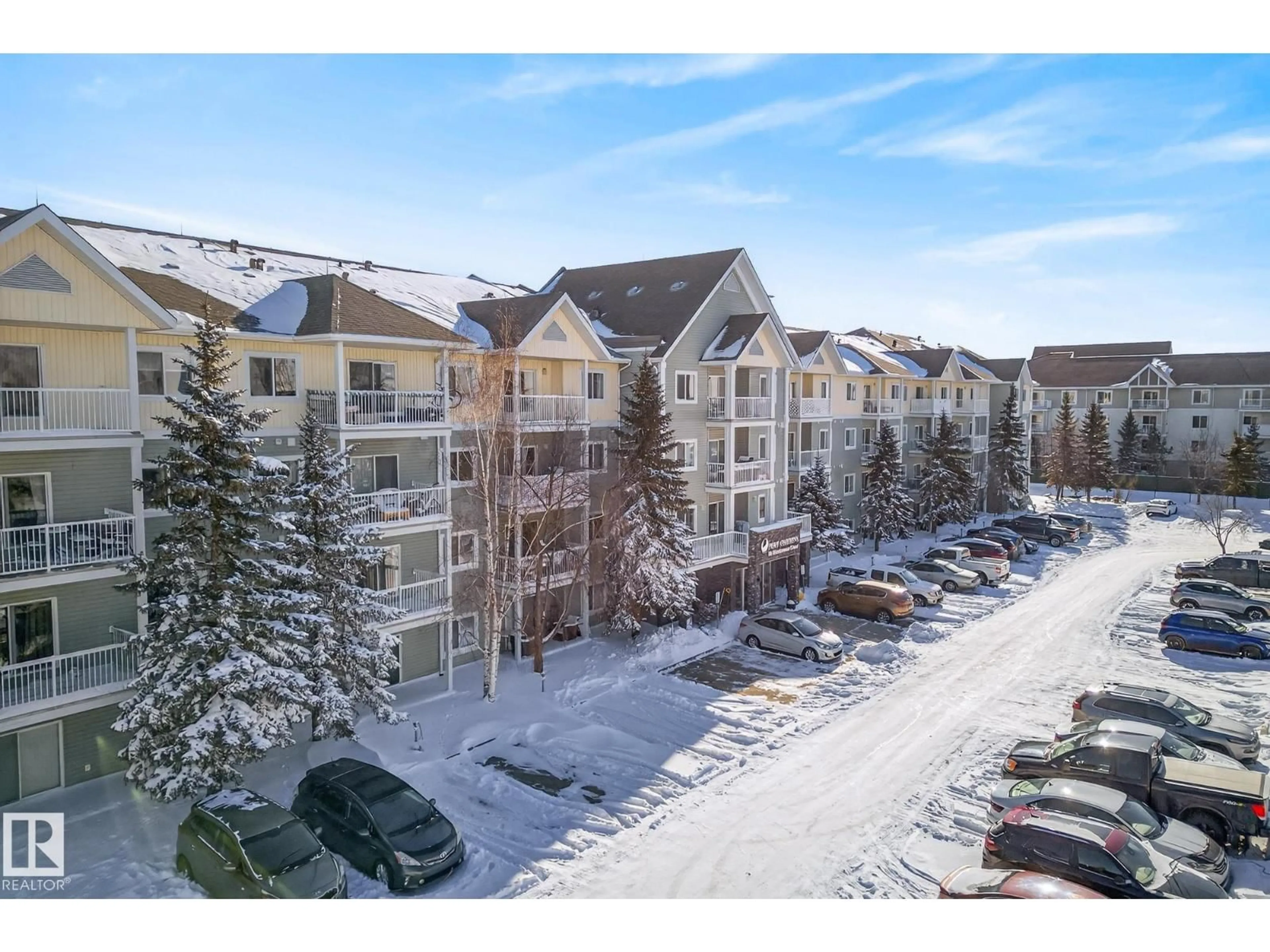 A pic from outside/outdoor area/front of a property/back of a property/a pic from drone, mountain view for 70 - 405 WOODSMERE CL, Fort Saskatchewan Alberta T8L4R8