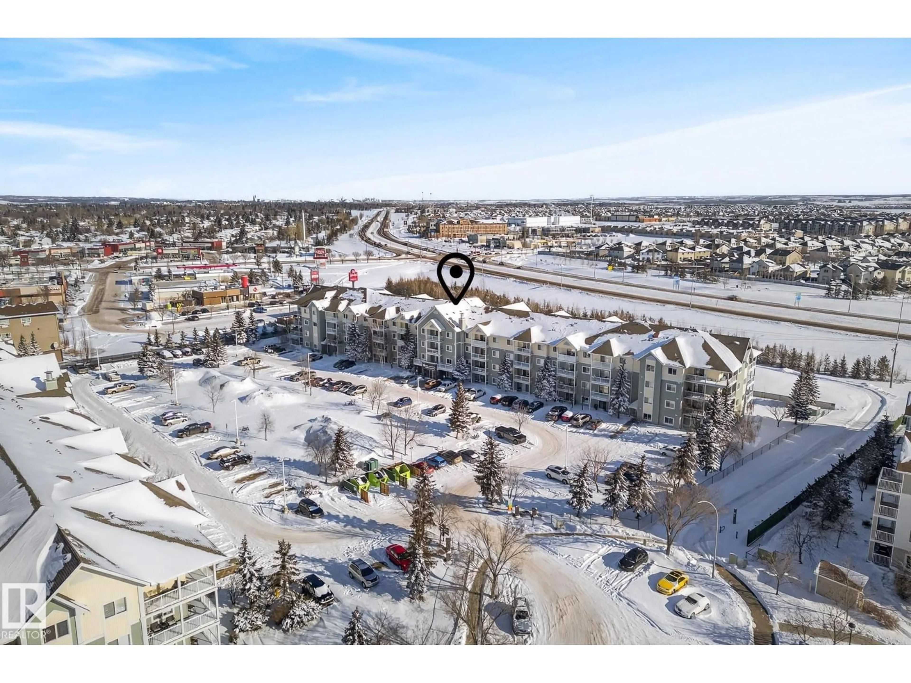A pic from outside/outdoor area/front of a property/back of a property/a pic from drone, unknown for 70 - 405 WOODSMERE CL, Fort Saskatchewan Alberta T8L4R8