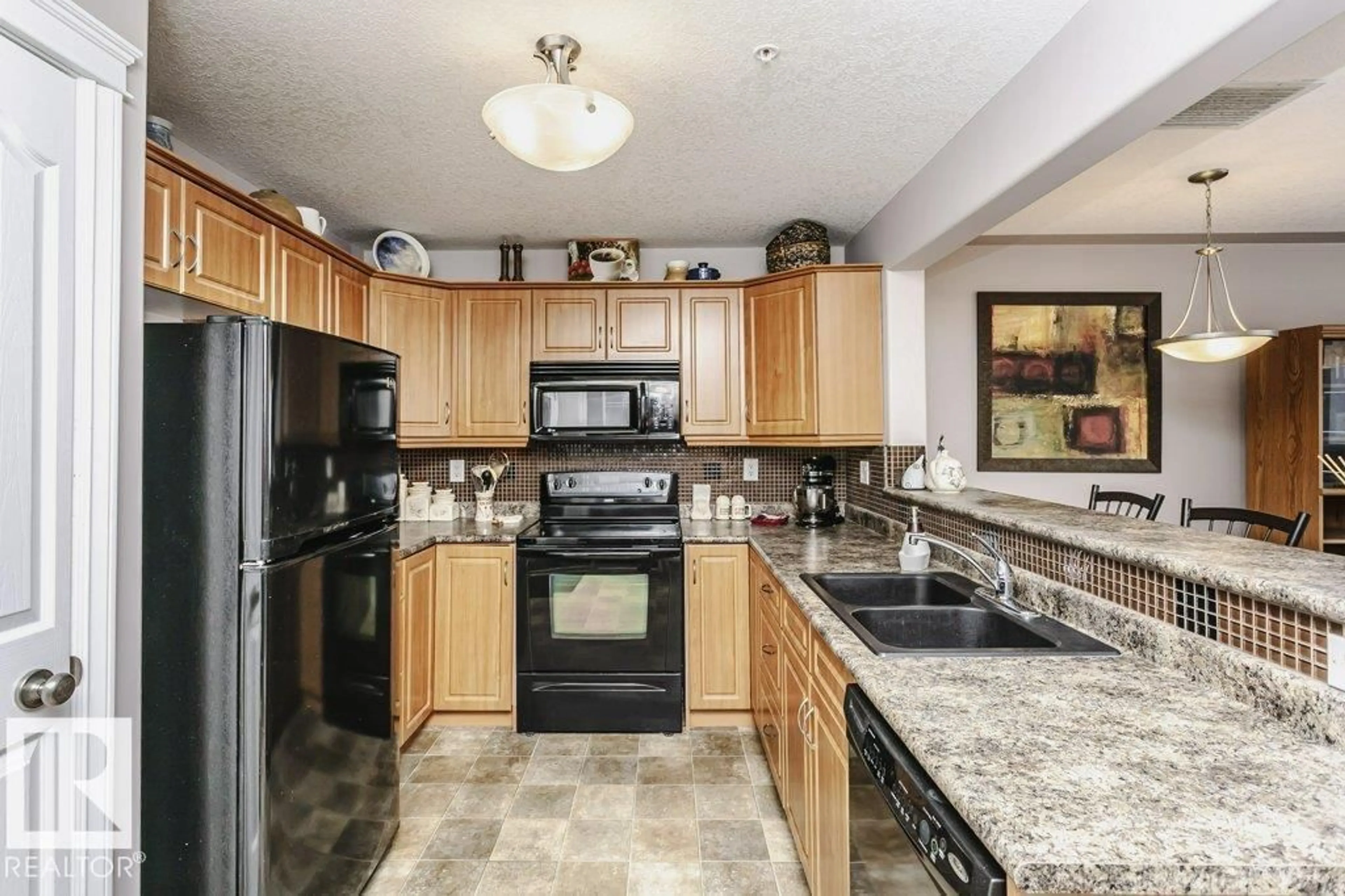 Standard kitchen, ceramic/tile floor for 7801 - 325 GOLF COURSE RD, Stony Plain Alberta T7Z0T7
