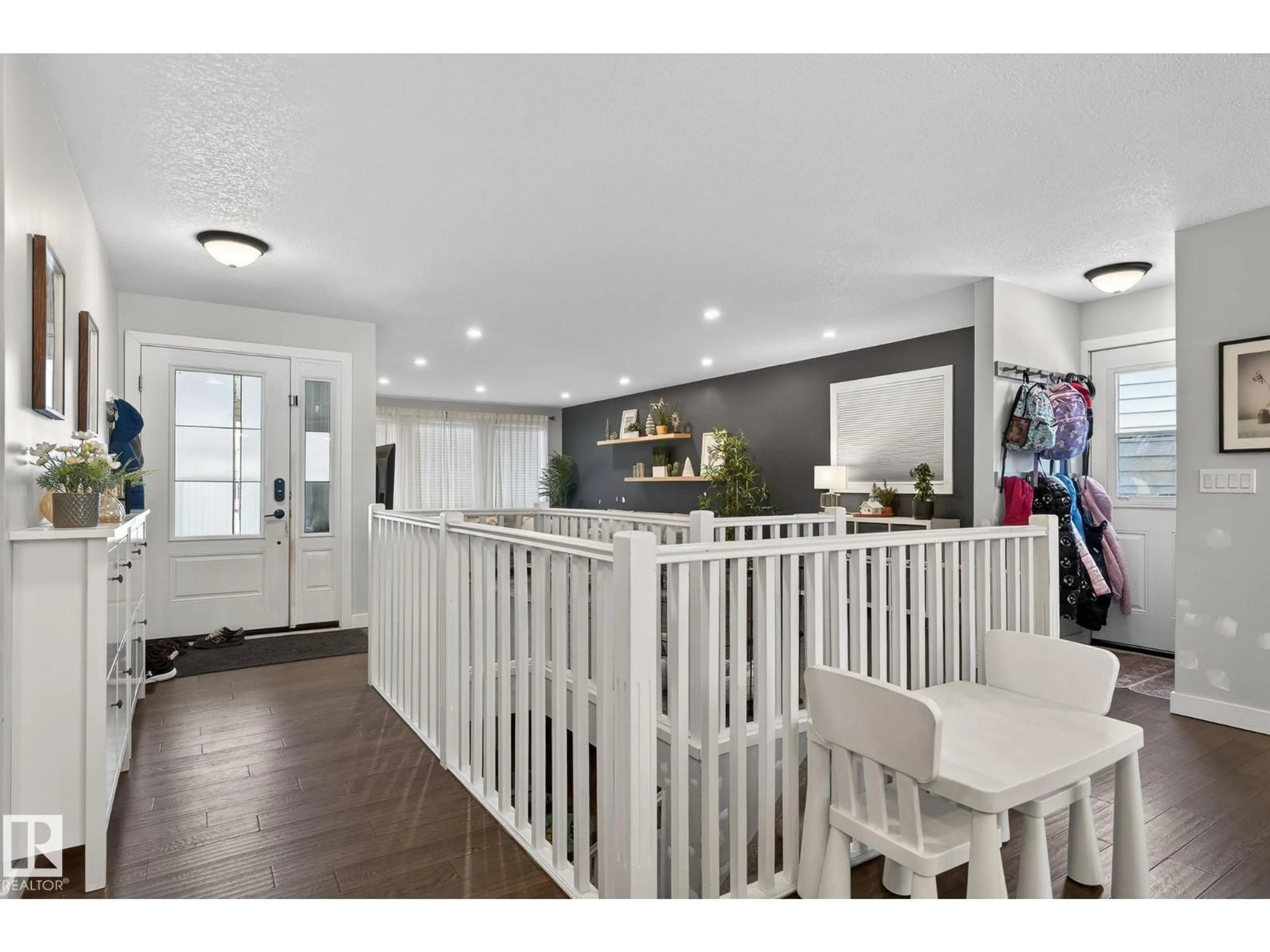 Open concept kitchen, wood/laminate floor for 25 STIRLING RD, Edmonton Alberta T5X4C2