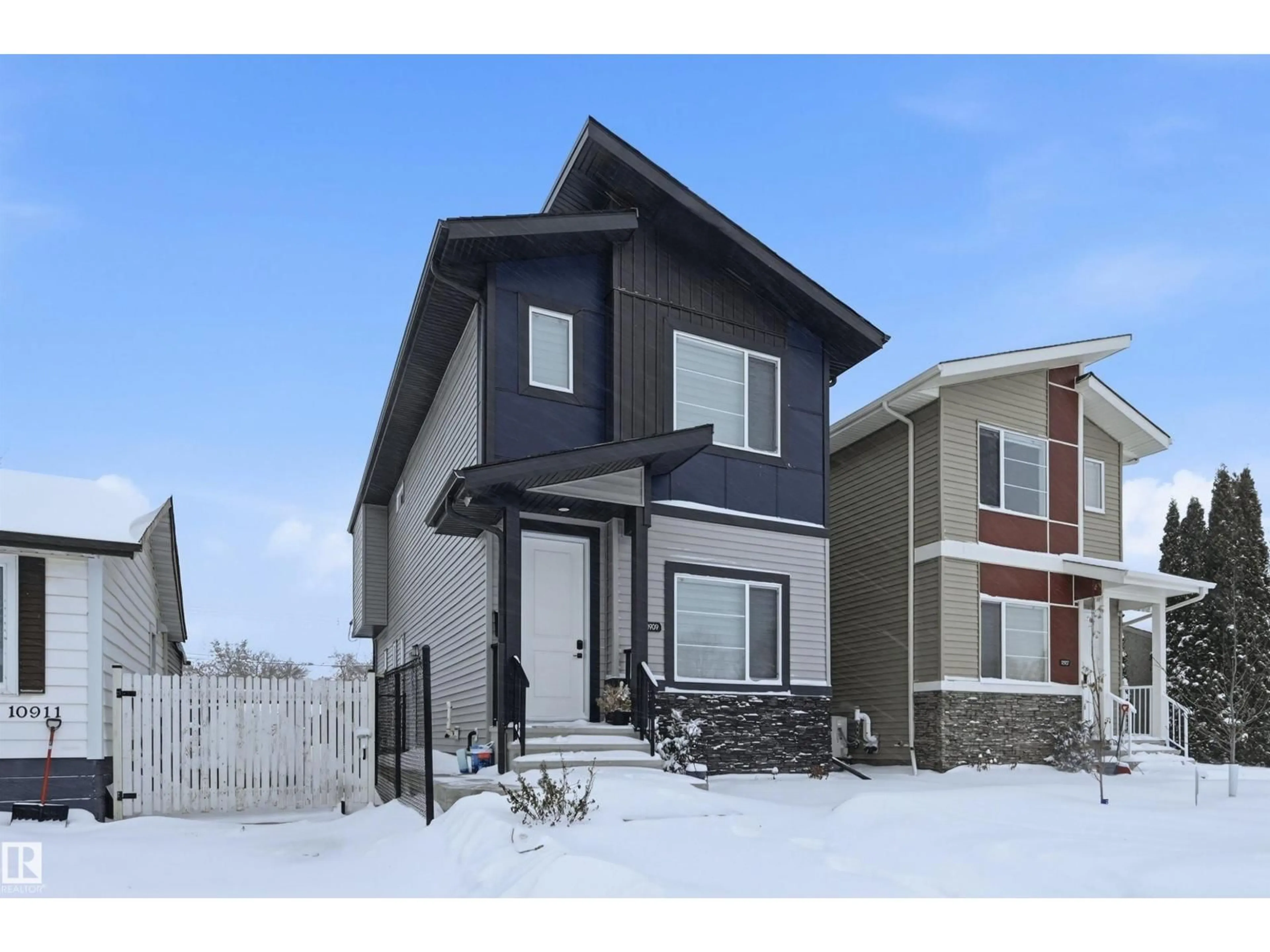 Home with vinyl exterior material, street for 10909 151 ST NW, Edmonton Alberta T5P1W2