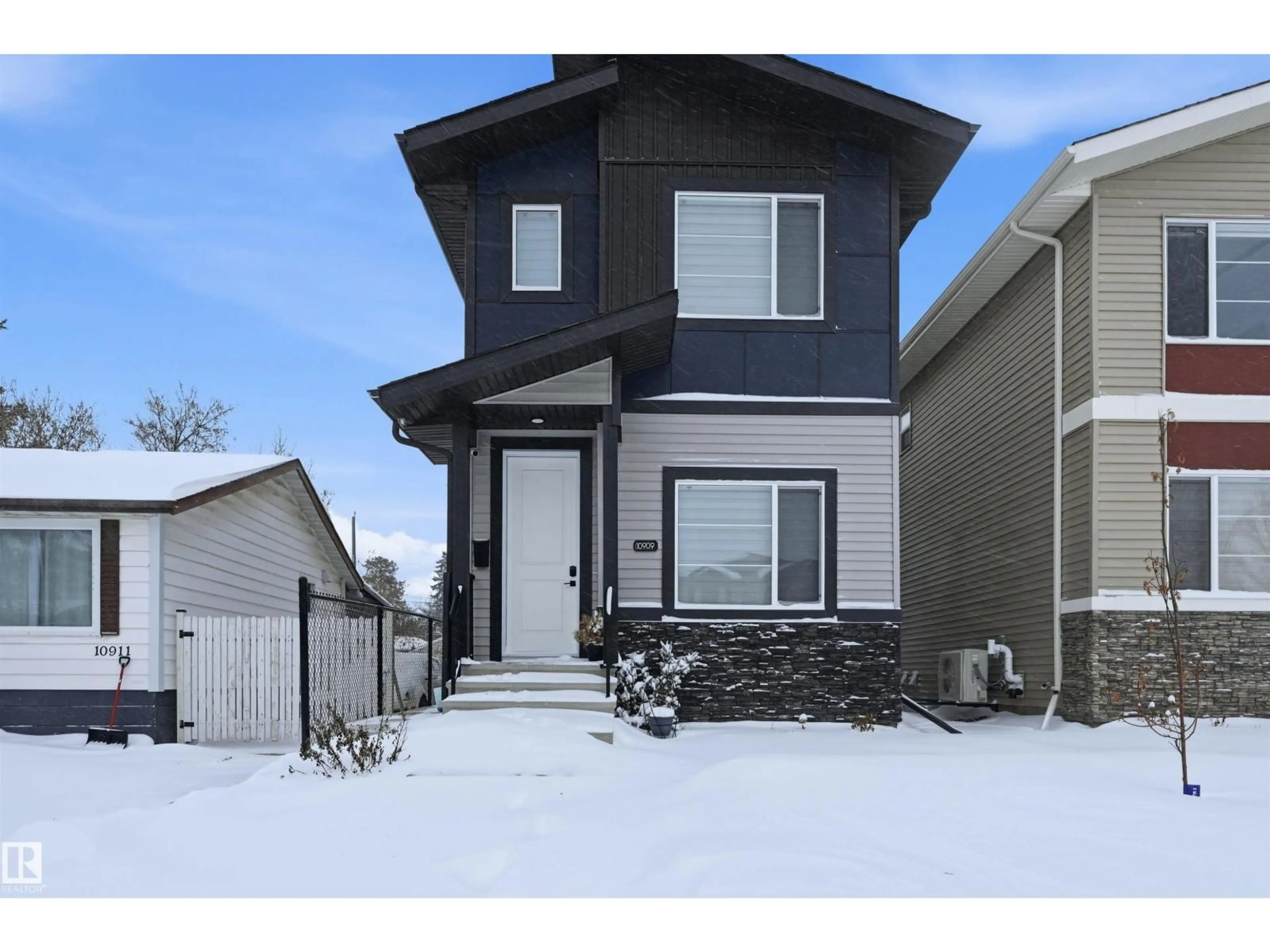 Home with vinyl exterior material, street for 10909 151 ST NW, Edmonton Alberta T5P1W2