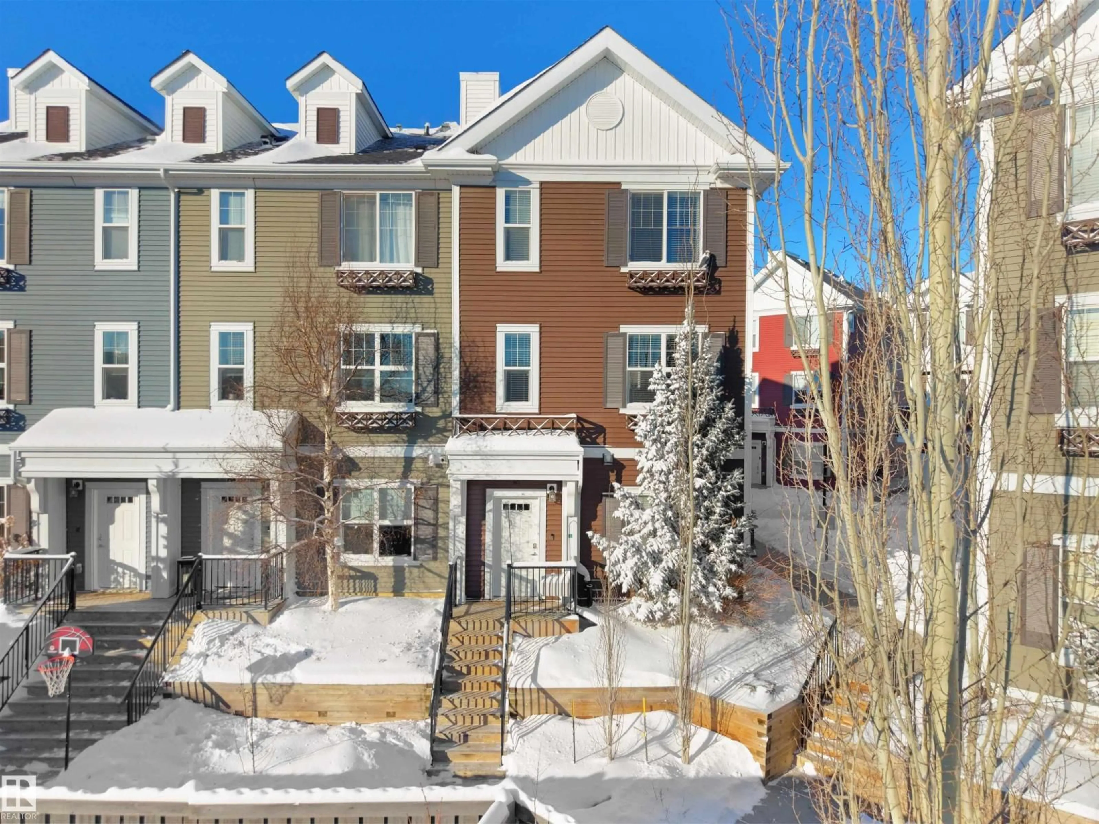 A pic from outside/outdoor area/front of a property/back of a property/a pic from drone, street for 2803 - 65 JAMES MOWATT TR, Edmonton Alberta T6W2P5