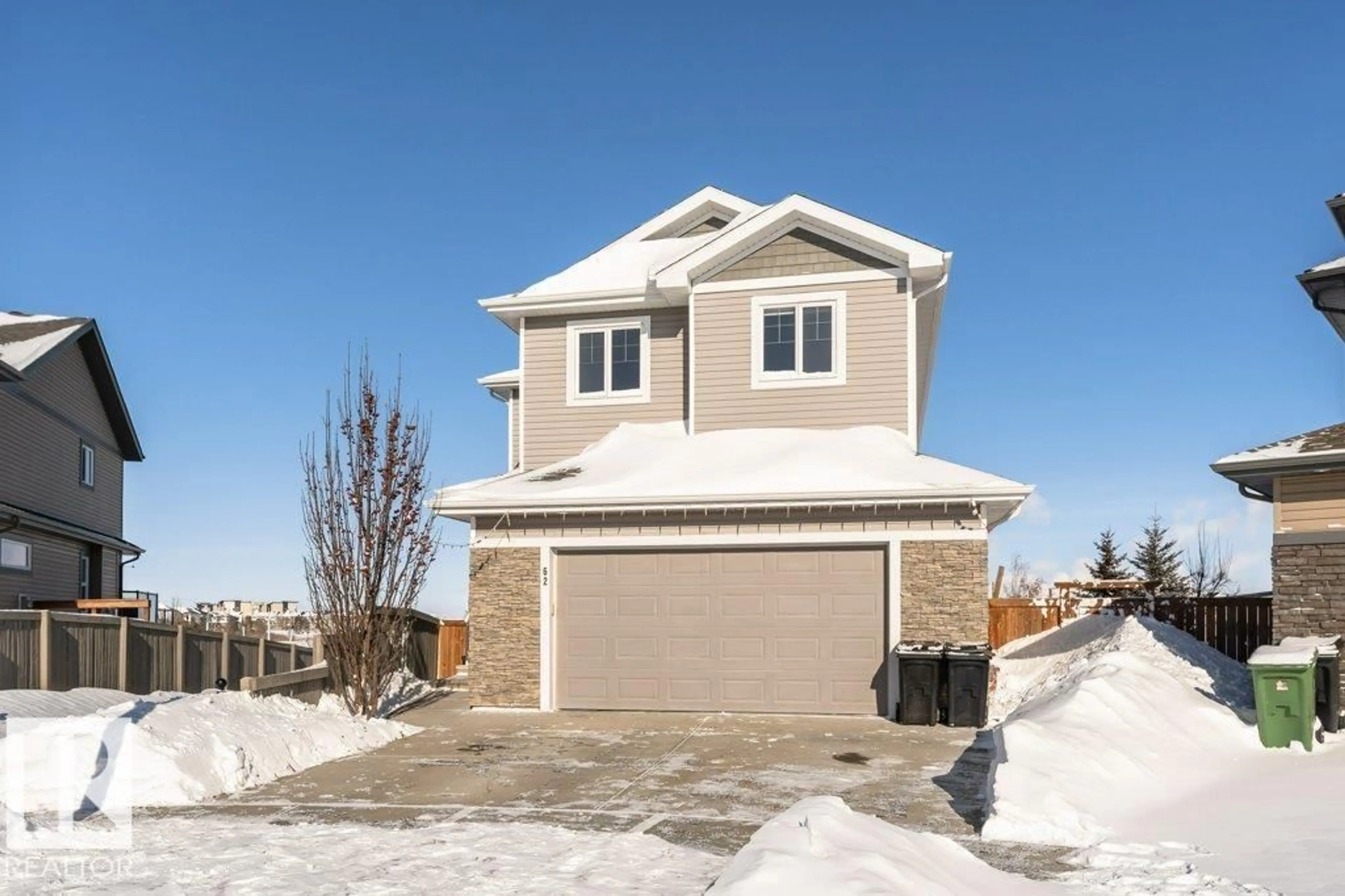 Home with vinyl exterior material, street for 62 ELLICE BN, Fort Saskatchewan Alberta T8L2T2