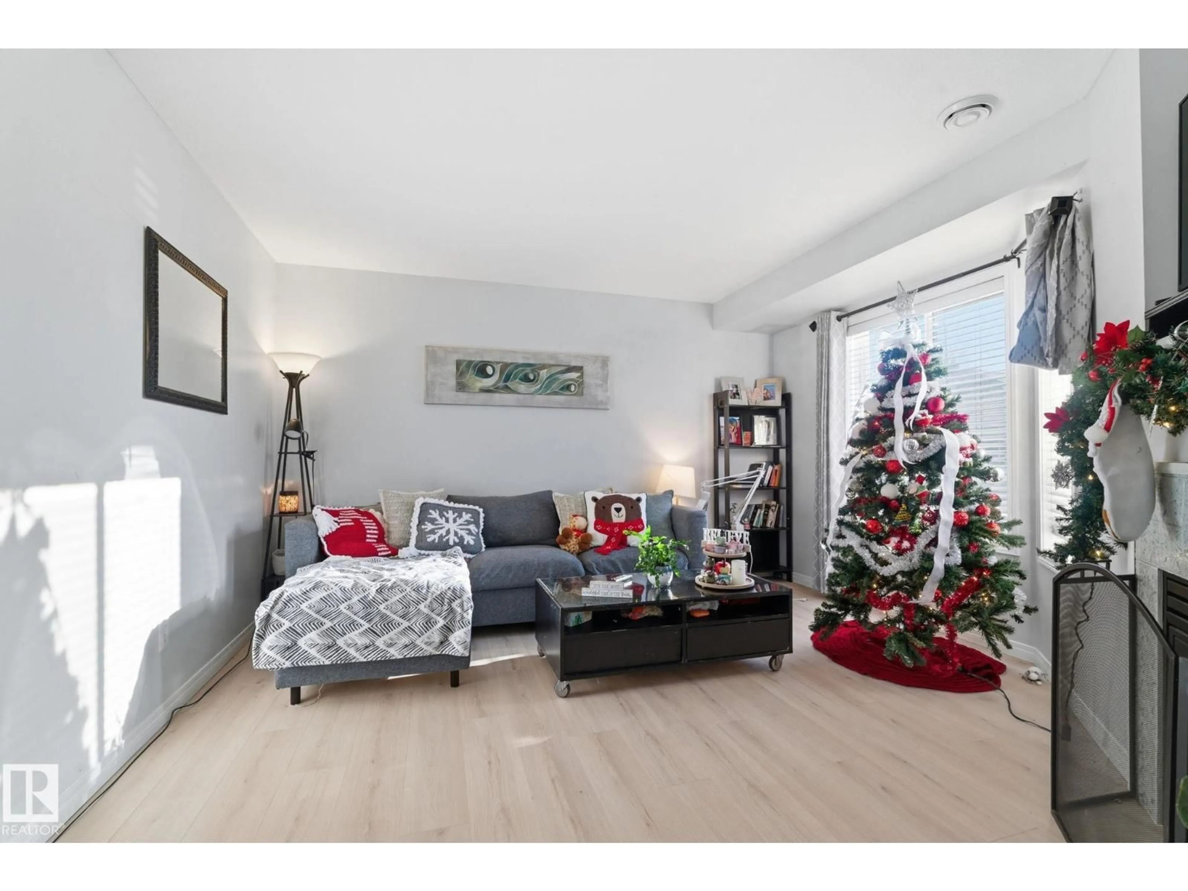 Living room with furniture, wood/laminate floor for #62 - 2505 42 ST, Edmonton Alberta T6L7G8