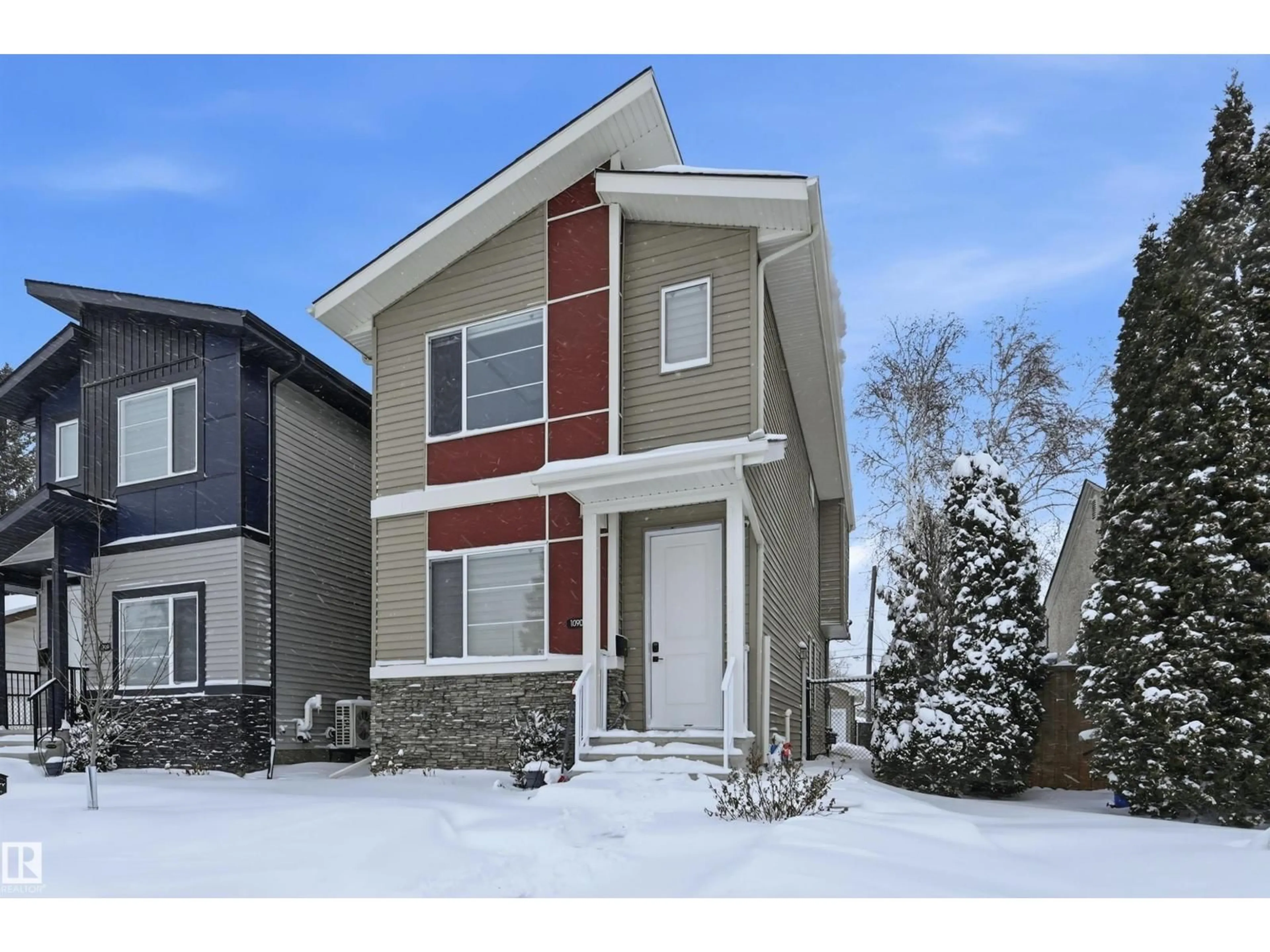 Home with vinyl exterior material, street for 10907 151 ST, Edmonton Alberta T5P1W2