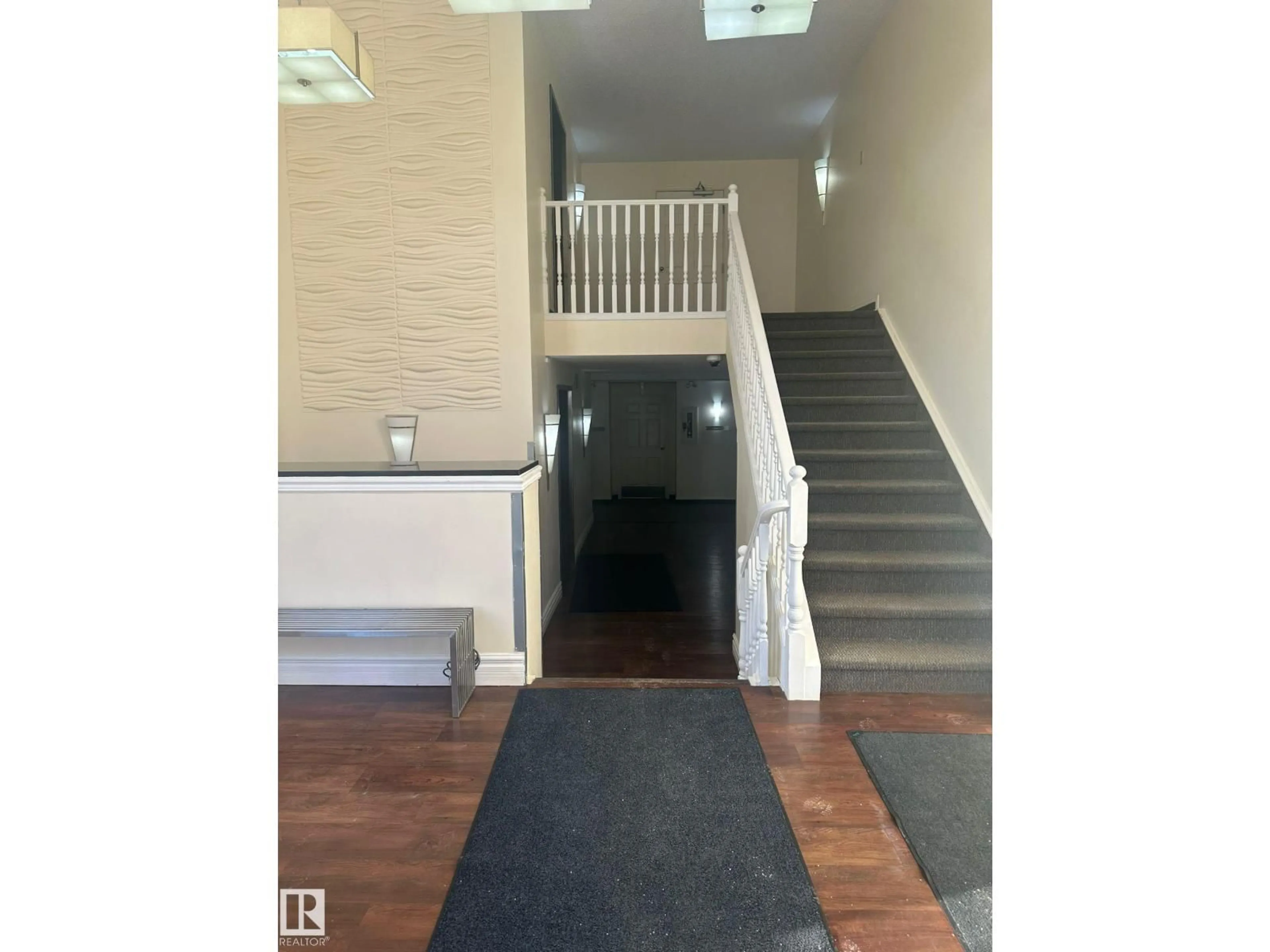 Indoor foyer for 106 - 9010 106 AV, Edmonton Alberta T5H4K3