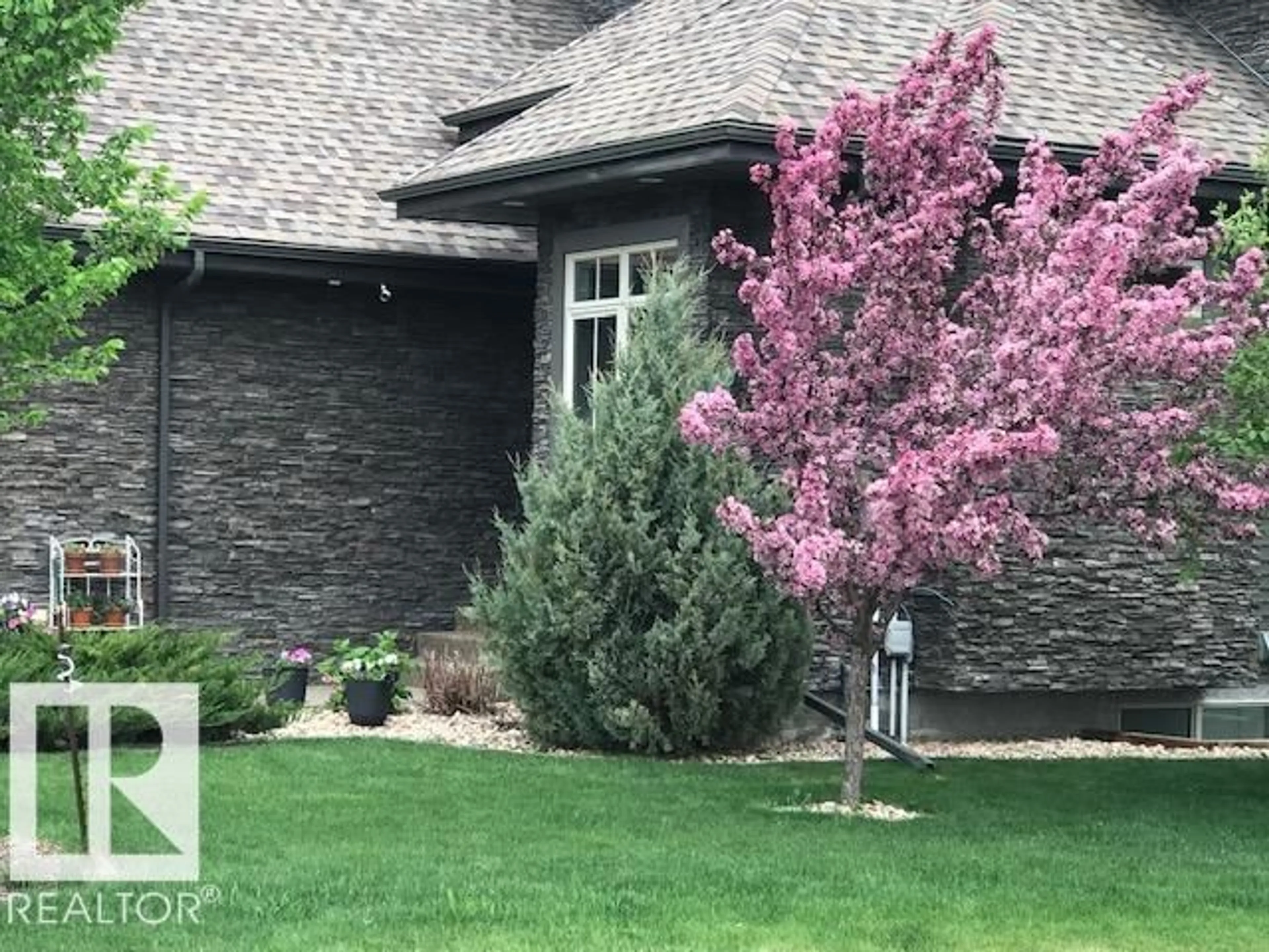 Home with brick exterior material, street for 176 AMBLESIDE DR, Edmonton Alberta T6W0H4