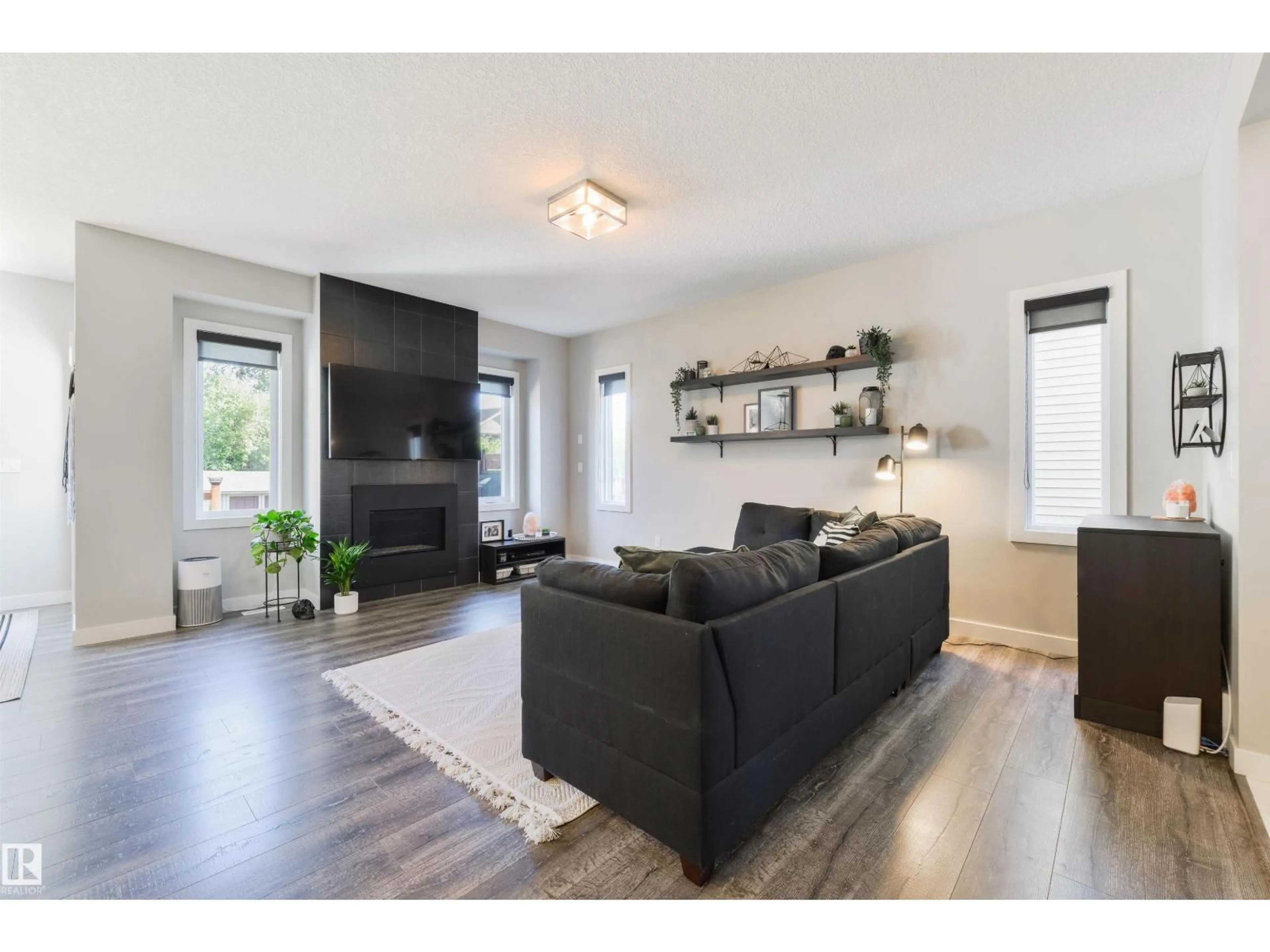 Living room with furniture, wood/laminate floor for 44 KENSINGTON CL, Spruce Grove Alberta T7X0S9
