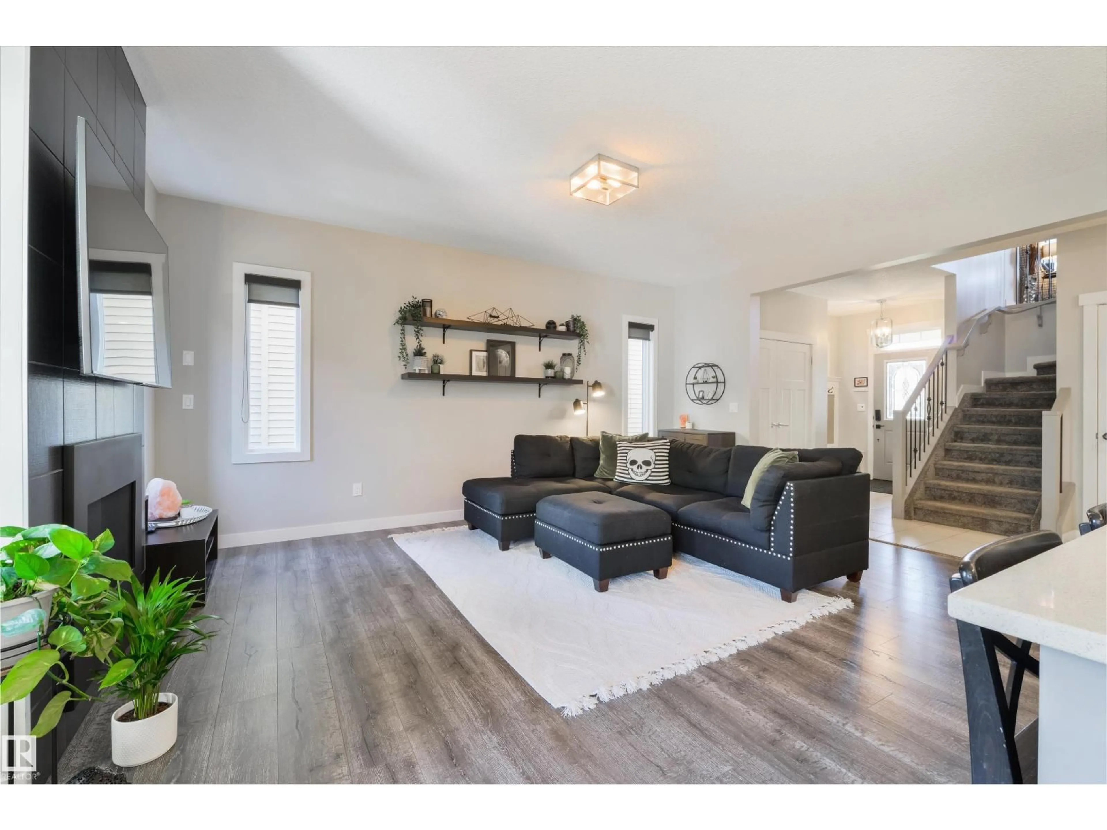 Living room with furniture, wood/laminate floor for 44 KENSINGTON CL, Spruce Grove Alberta T7X0S9