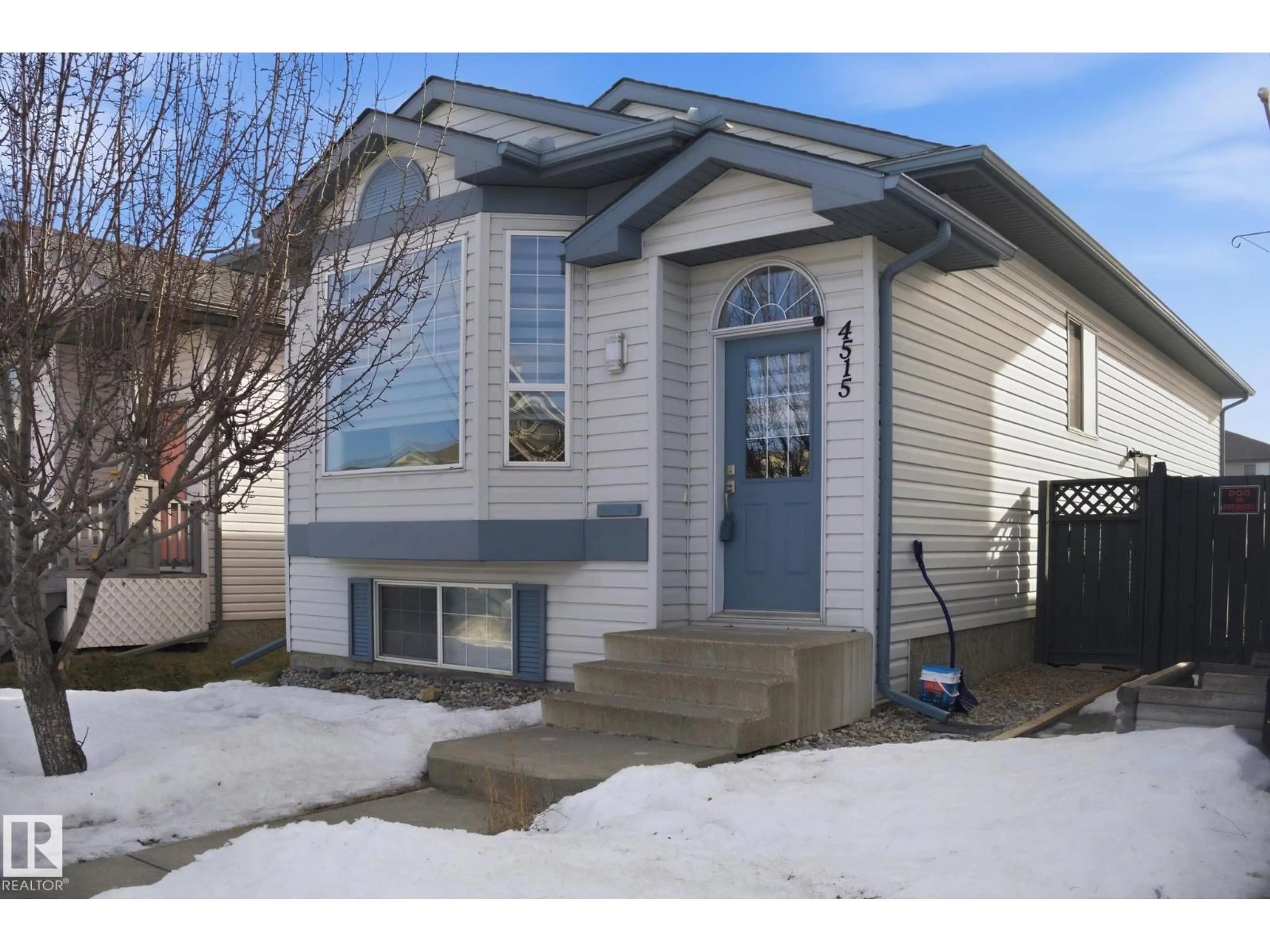 Home with vinyl exterior material, street for 4515 149 AV, Edmonton Alberta T5Y2Y9